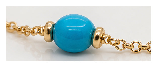 Turquoise bead detail on 18ct yellow gold bracelet