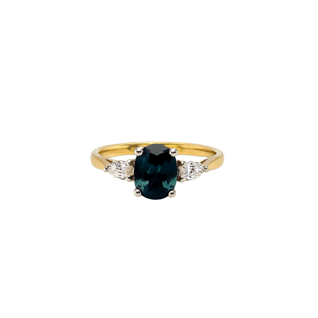 Oval cut Teal sapphire with pear diamonds