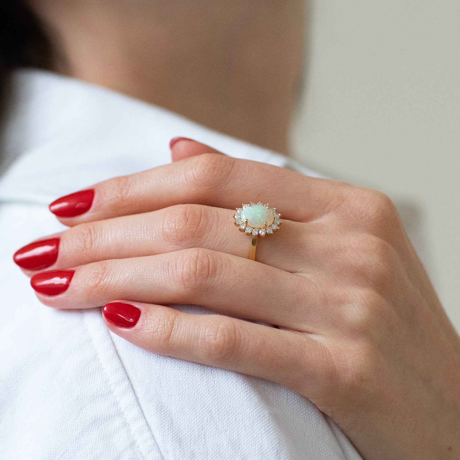 2.50ct Oval Opal Ring with Diamond Halo