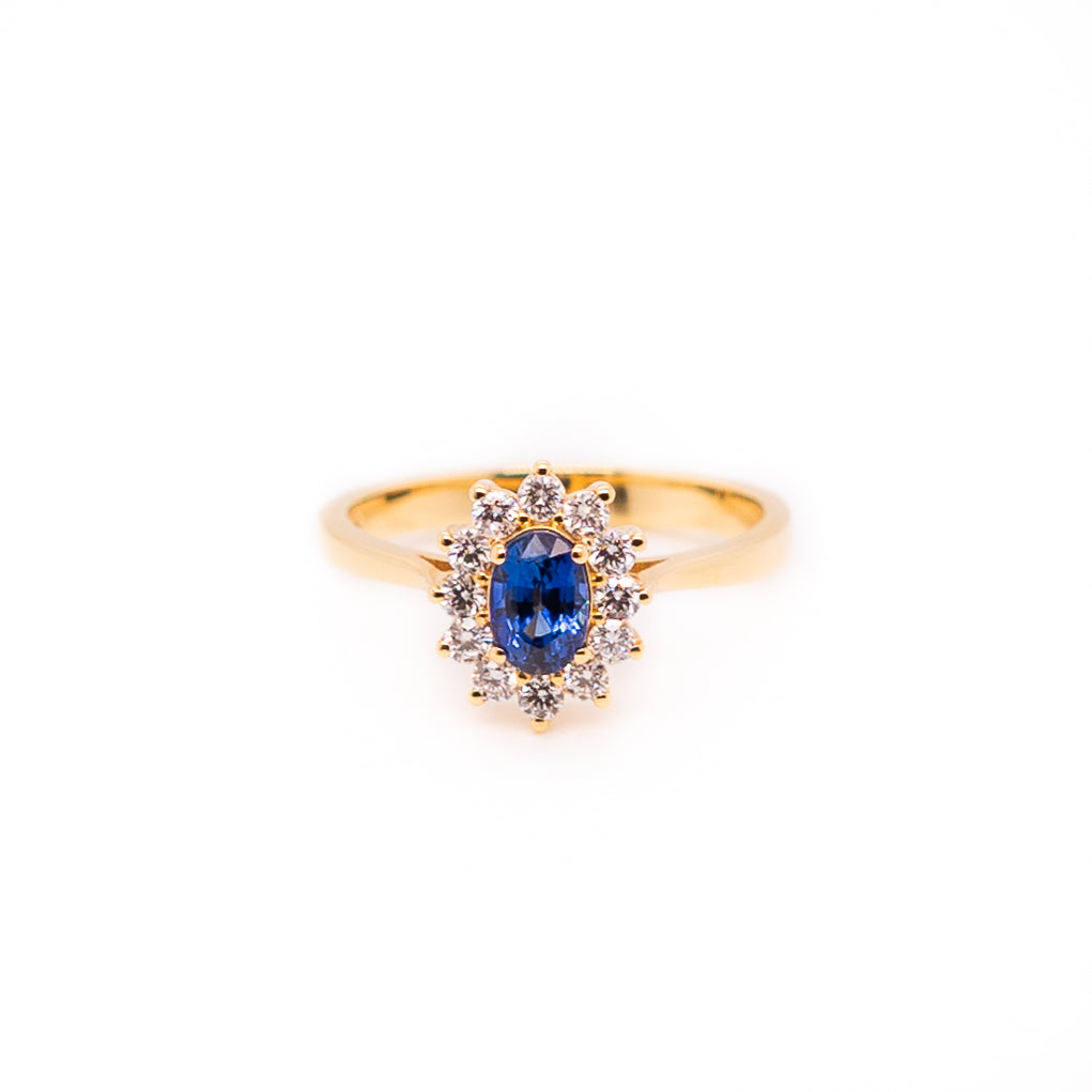Oval Sapphire Ring with Diamond Halo