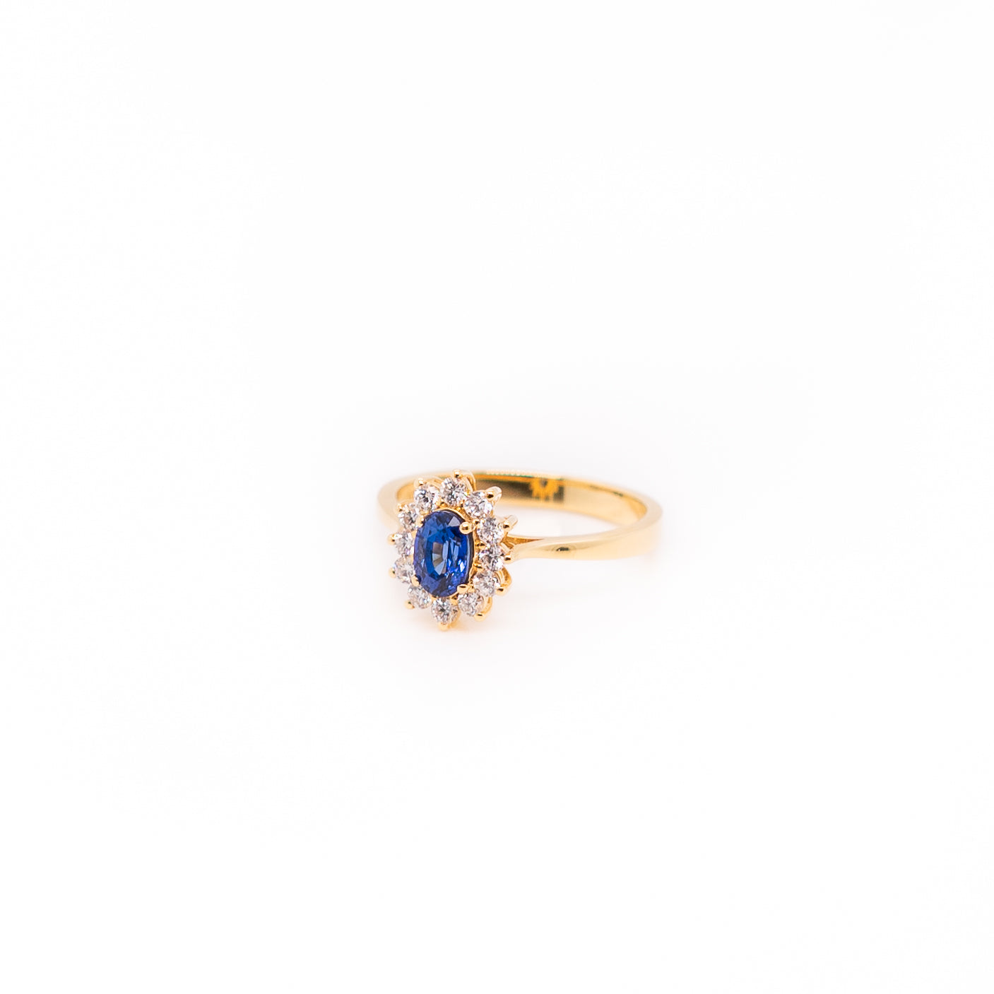 Oval Sapphire Ring with Diamond Halo