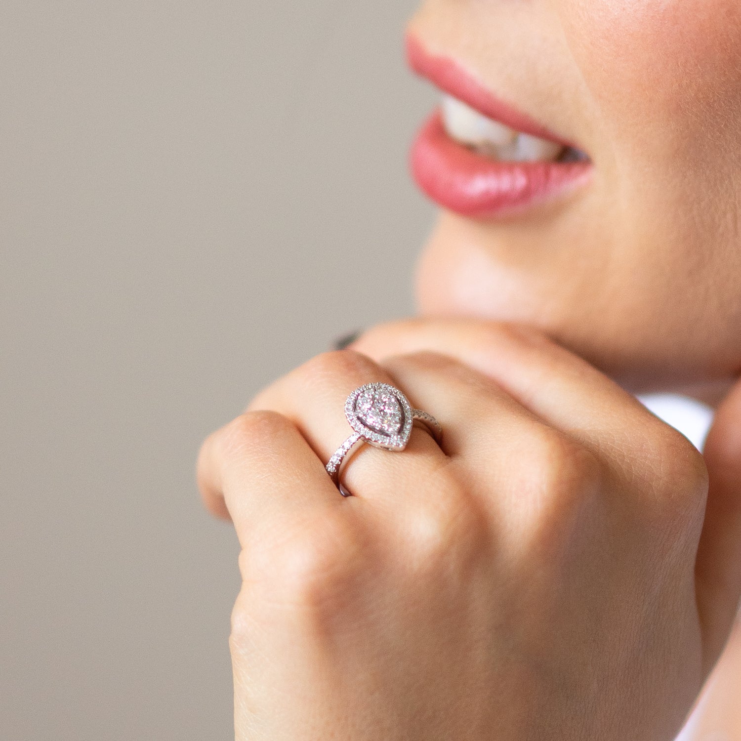 0.80ct Pear shape Diamond Cluster Ring with Halo