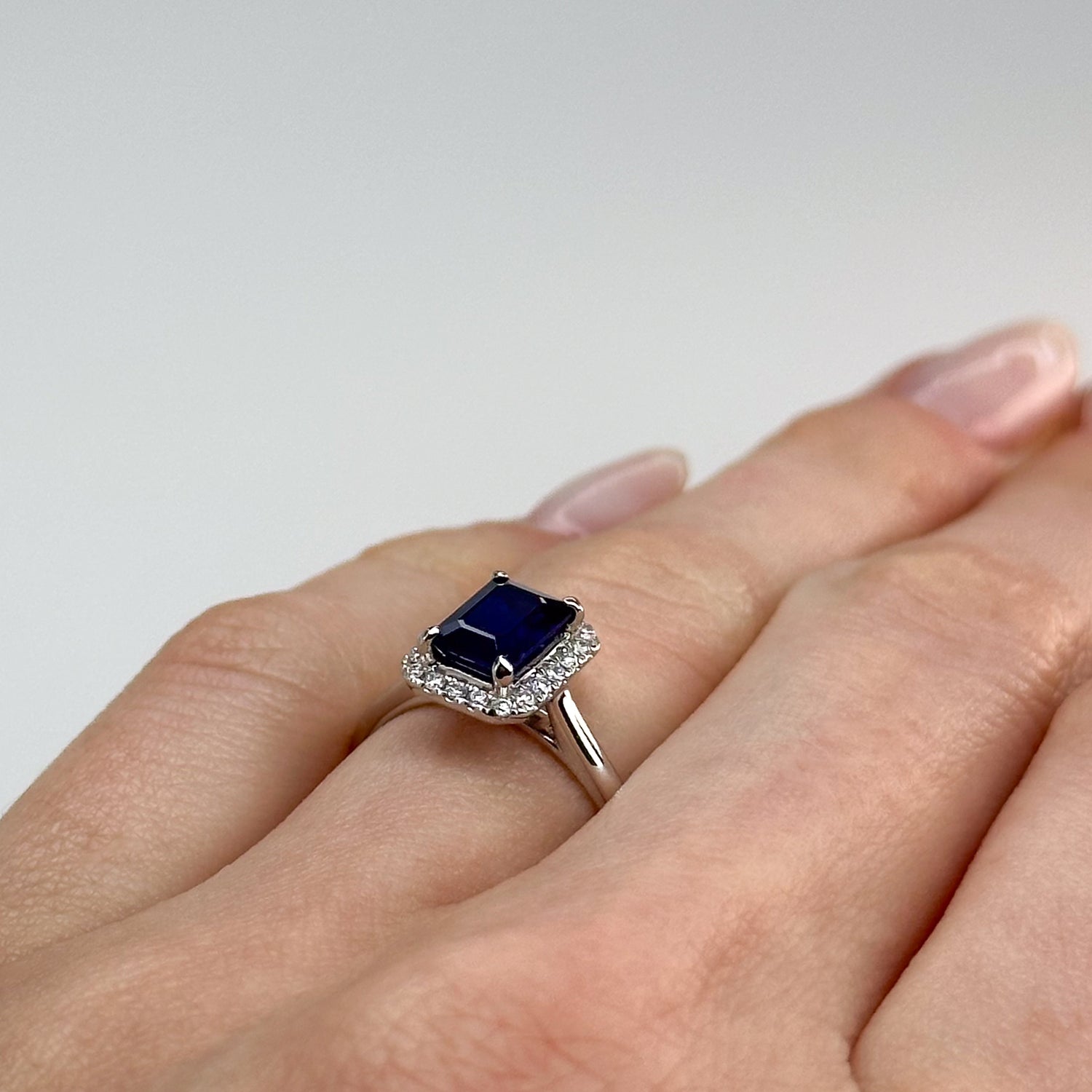 1.43ct Emerald Cut Deep Blue Sapphire Ring
