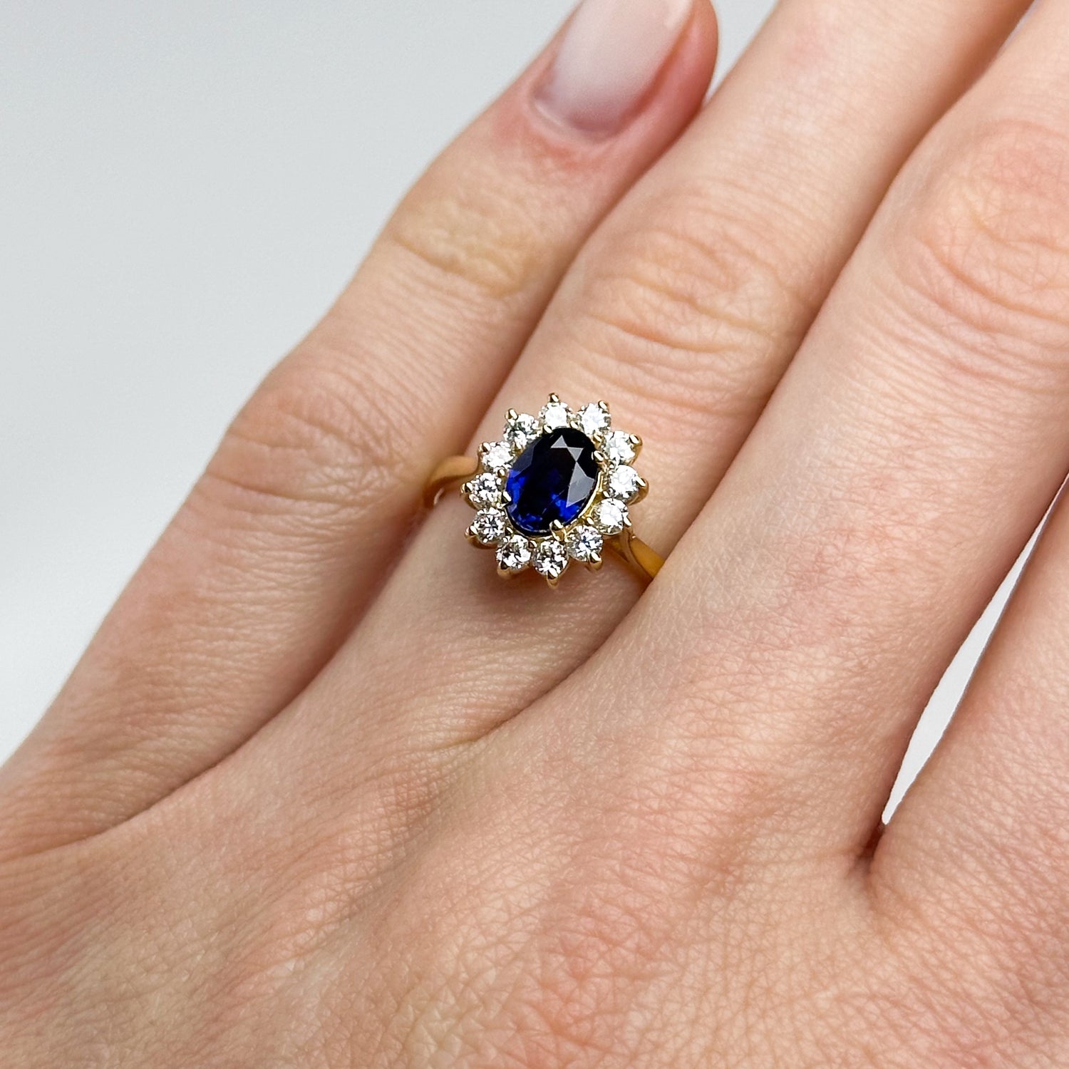 0.83ct Oval Cut Deep Blue Sapphire Ring