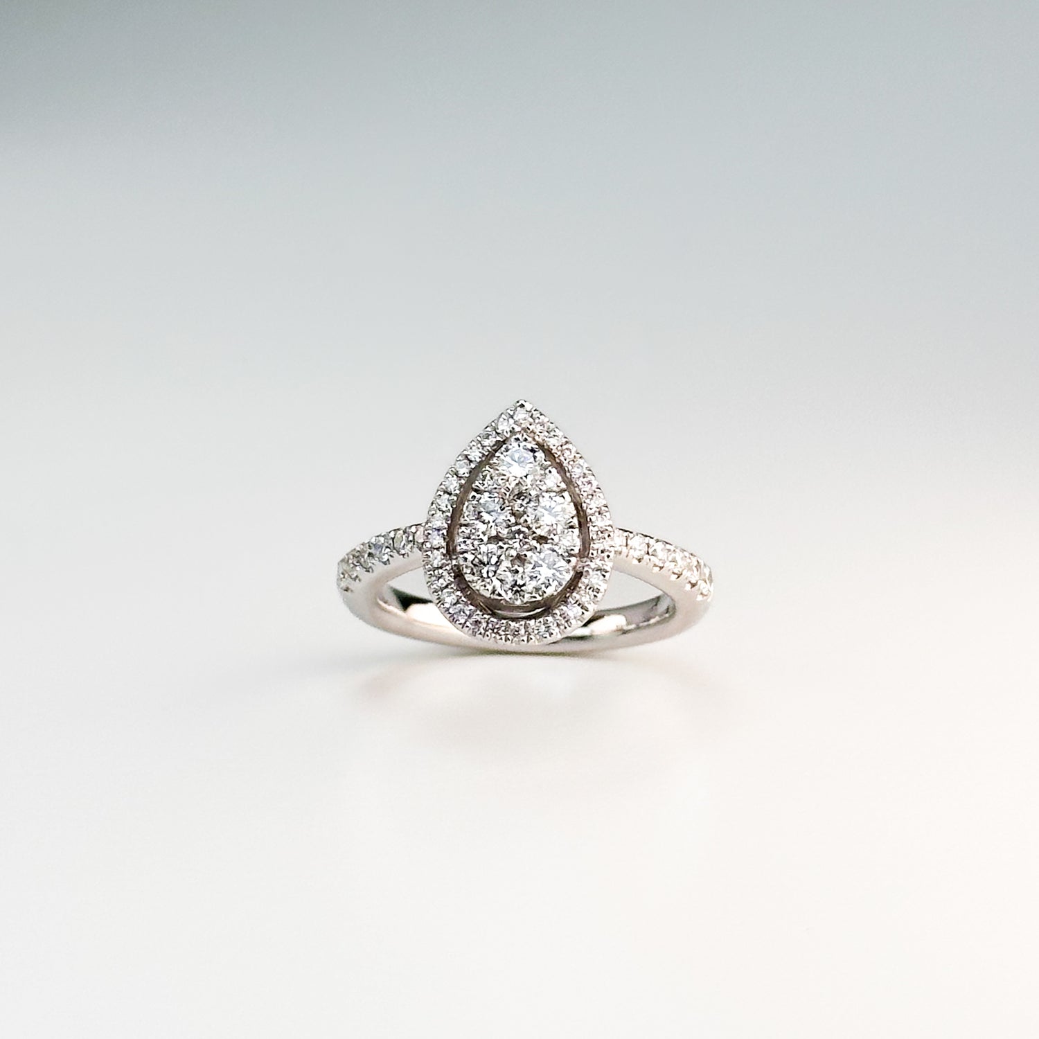 0.80ct Pear shape Diamond Cluster Ring with Halo