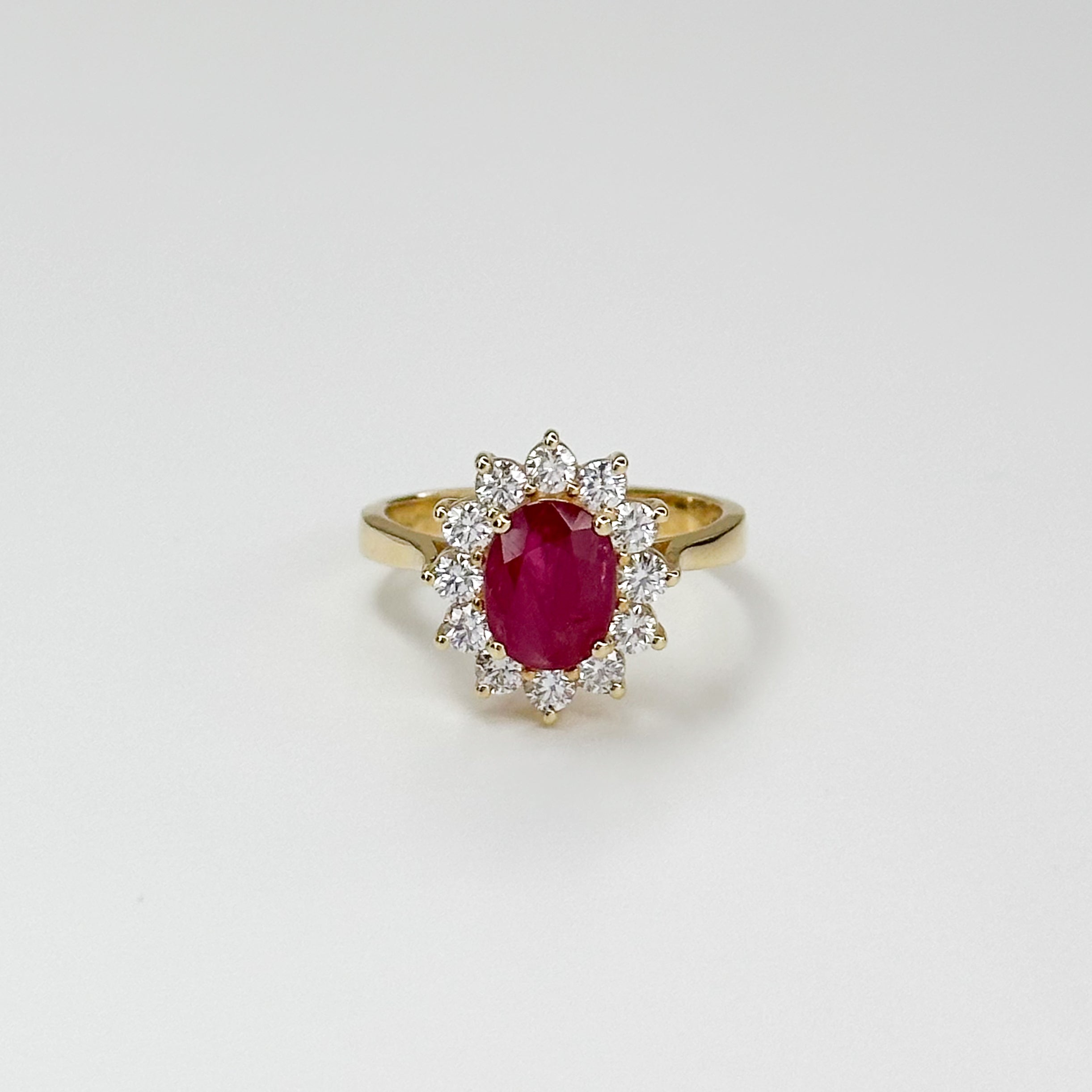1.70ct Oval Cut Ruby Ring with Diamond Halo