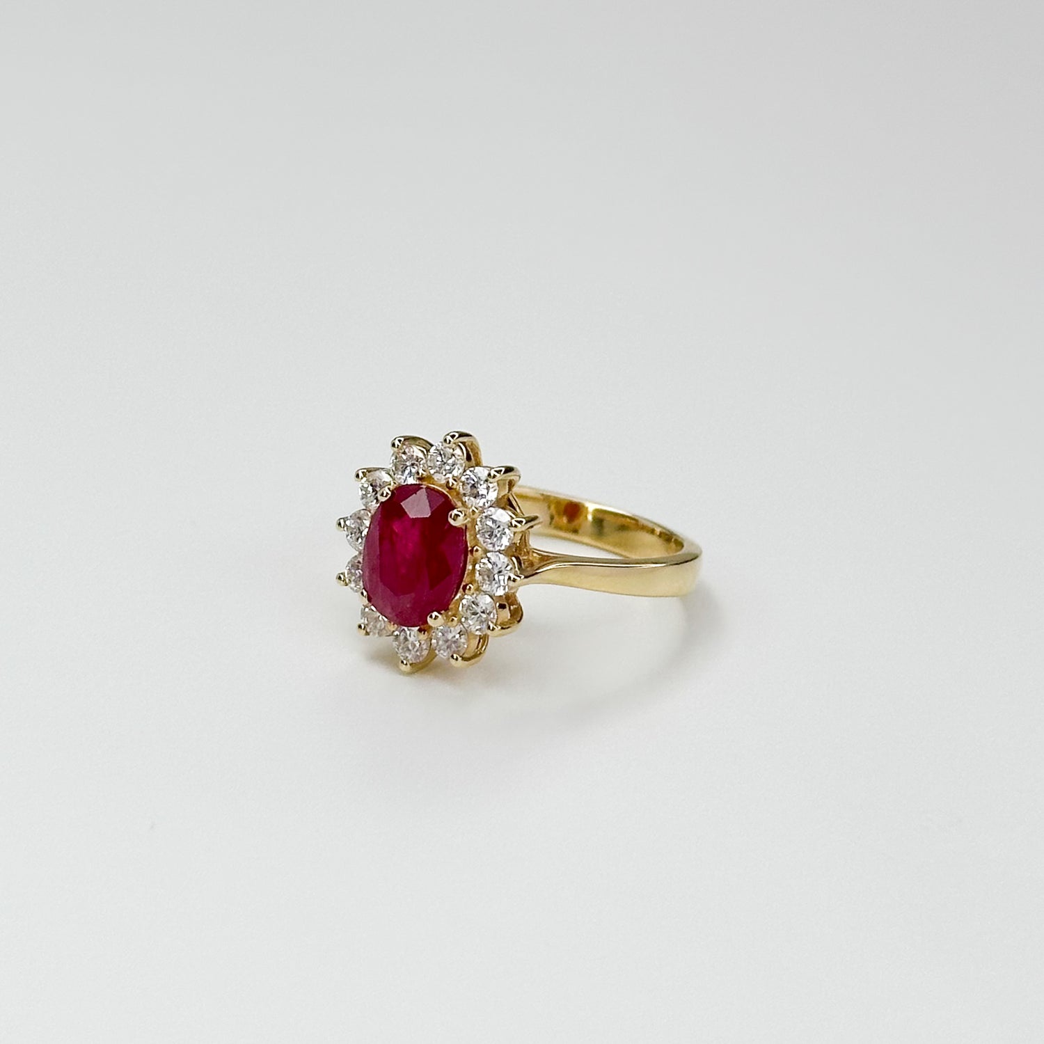 1.70ct Oval Cut Ruby Ring with Diamond Halo