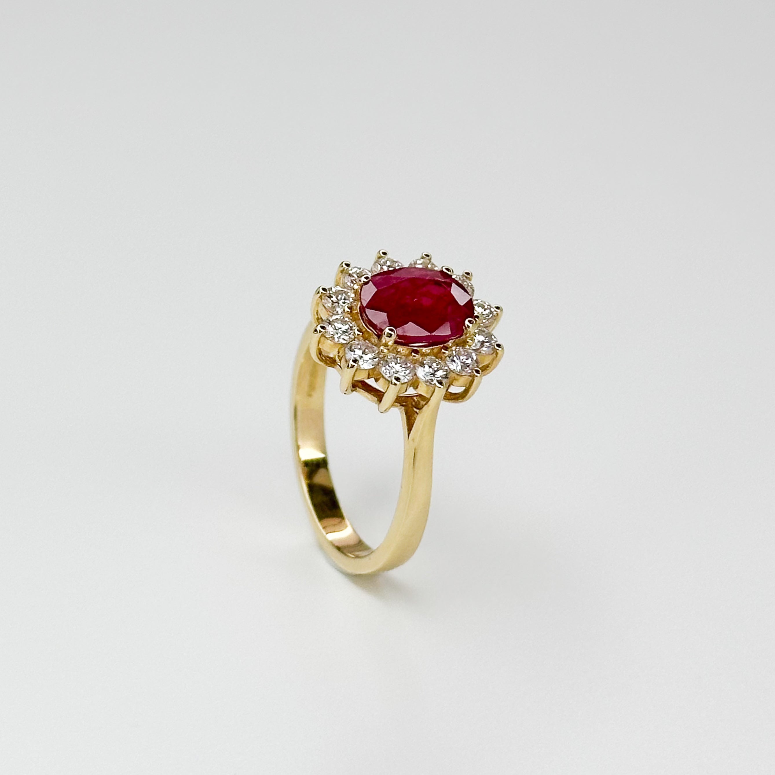 1.70ct Oval Cut Ruby Ring with Diamond Halo