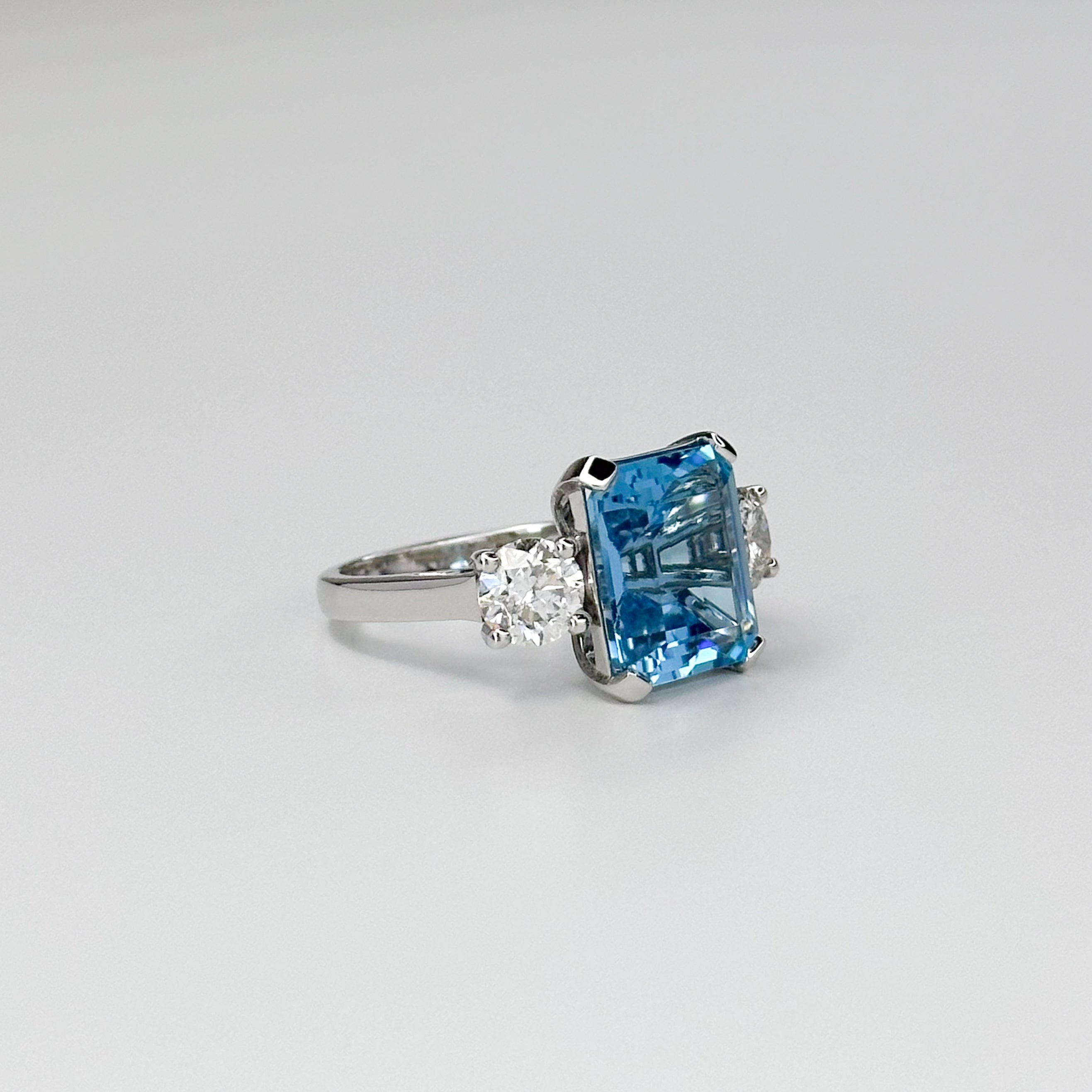 Blue Topaz Trilogy Ring with Diamonds