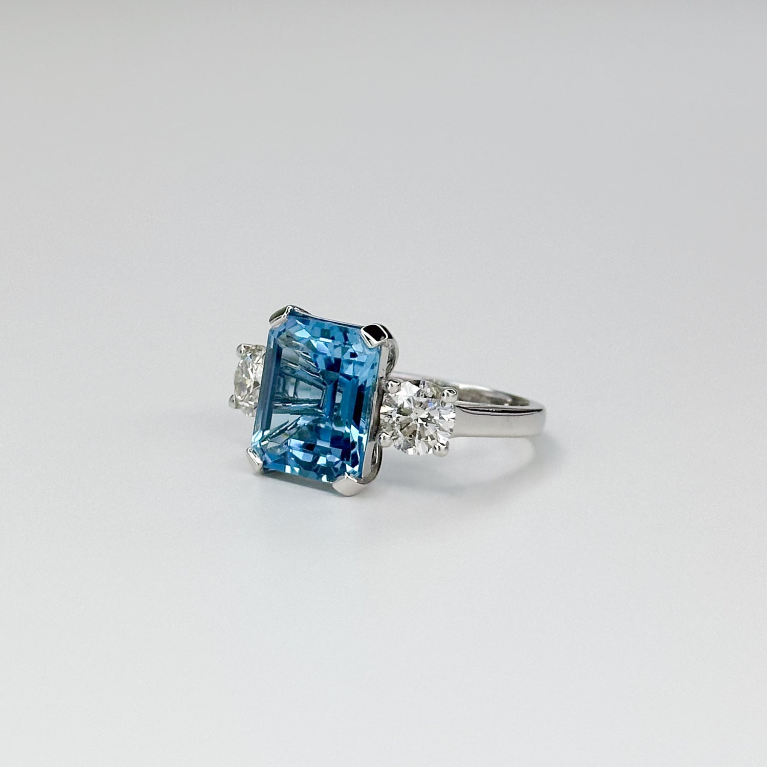 Blue Topaz Trilogy Ring with Diamonds
