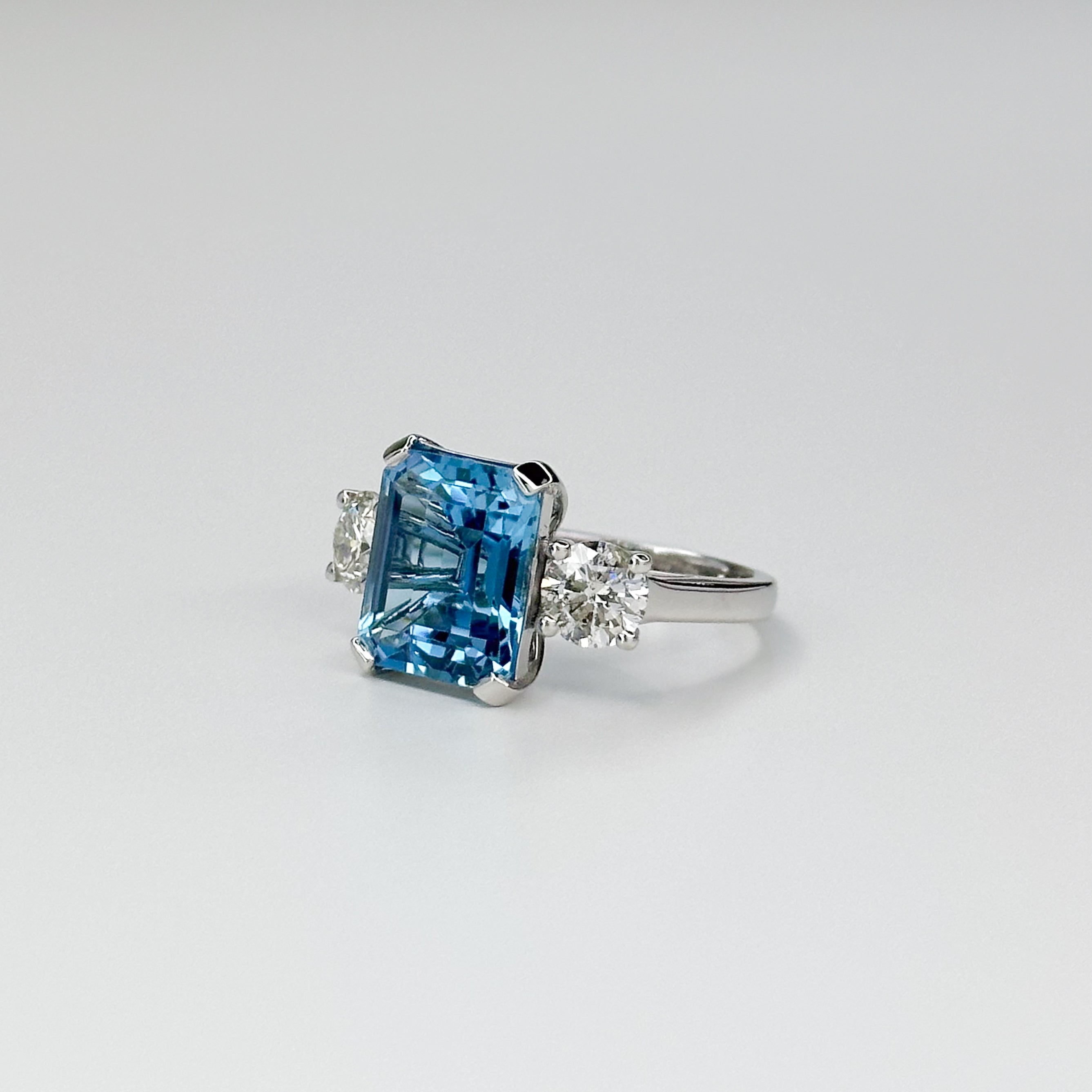 Blue Topaz Trilogy Ring with Diamonds