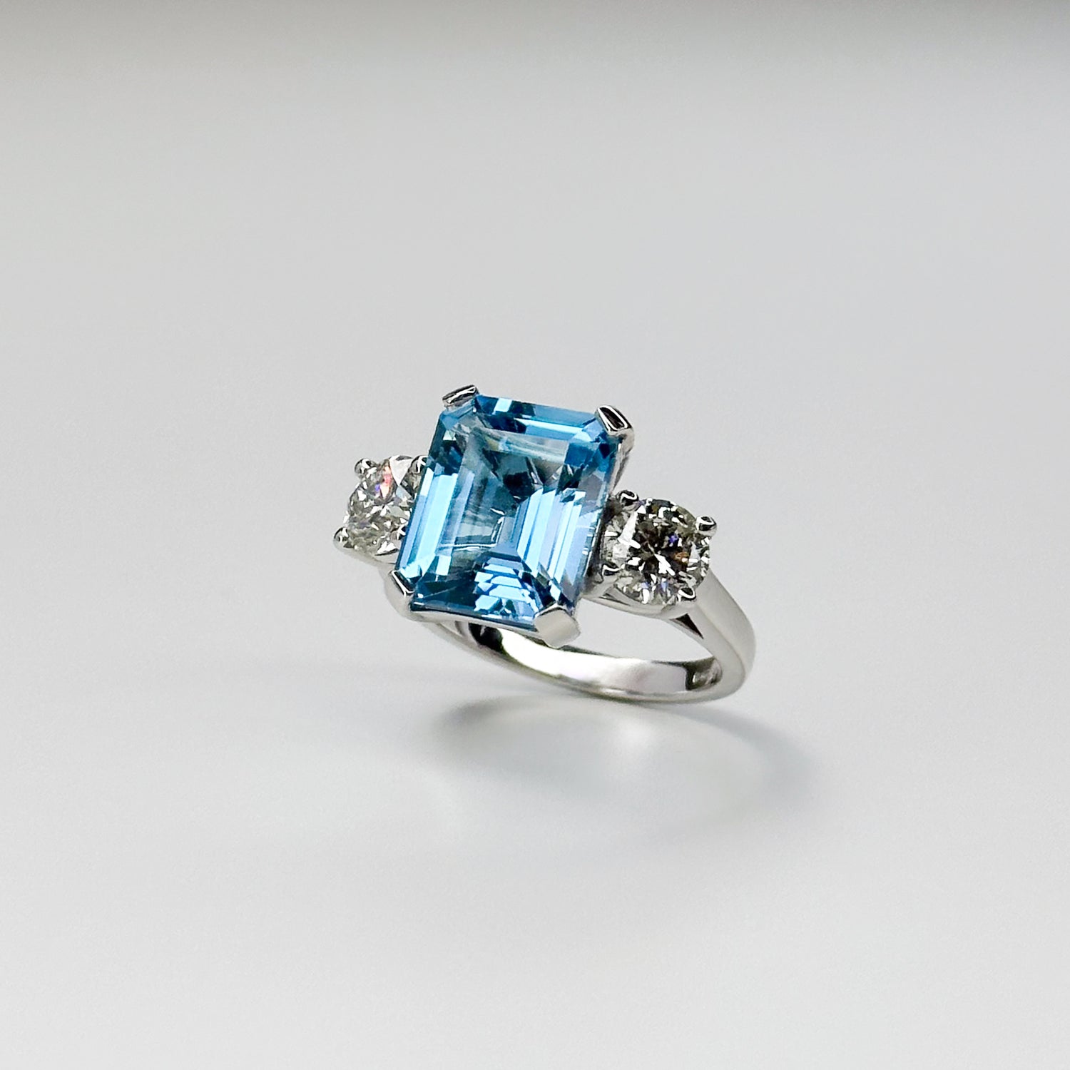 Blue Topaz Trilogy Ring with Diamonds