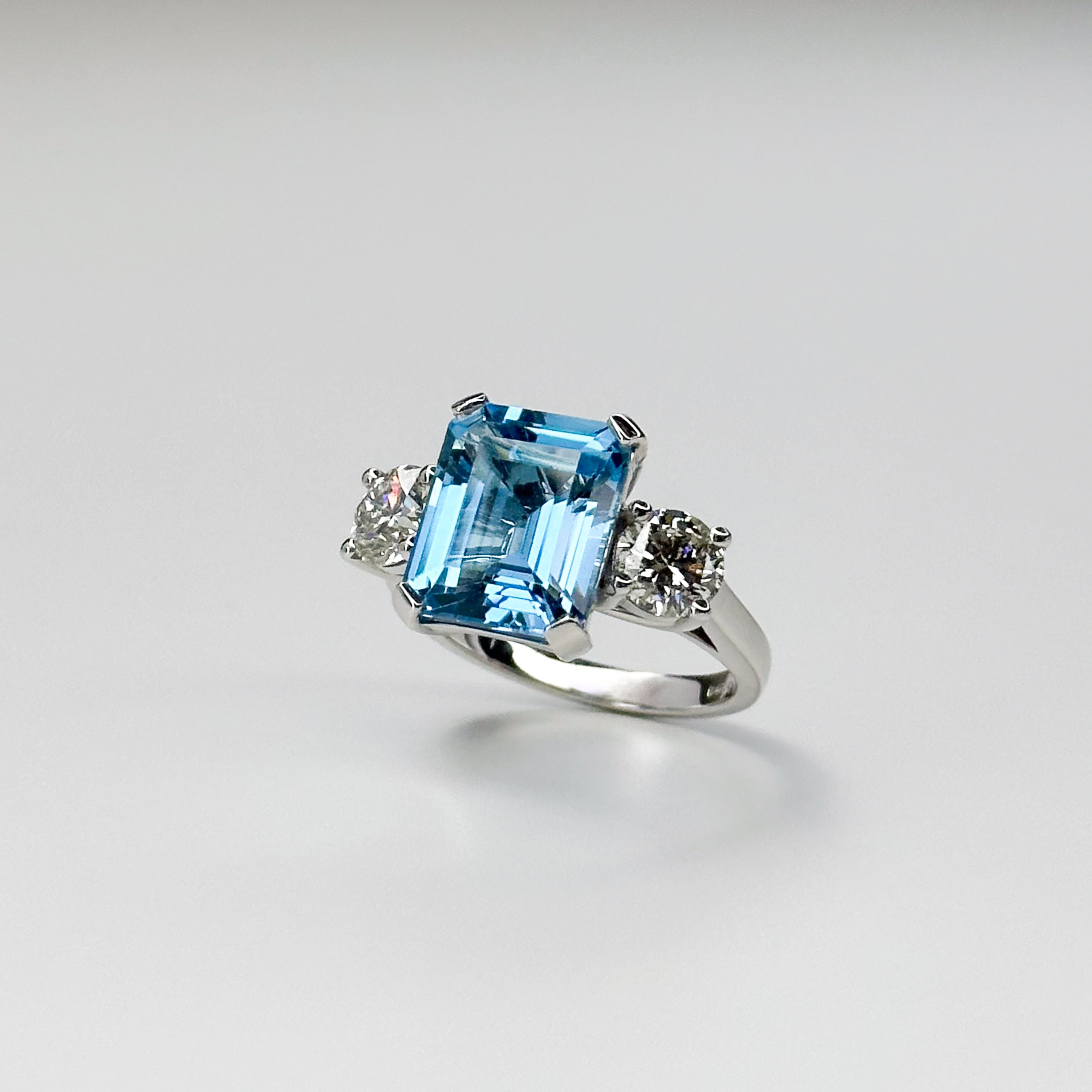 Blue Topaz Trilogy Ring with Diamonds
