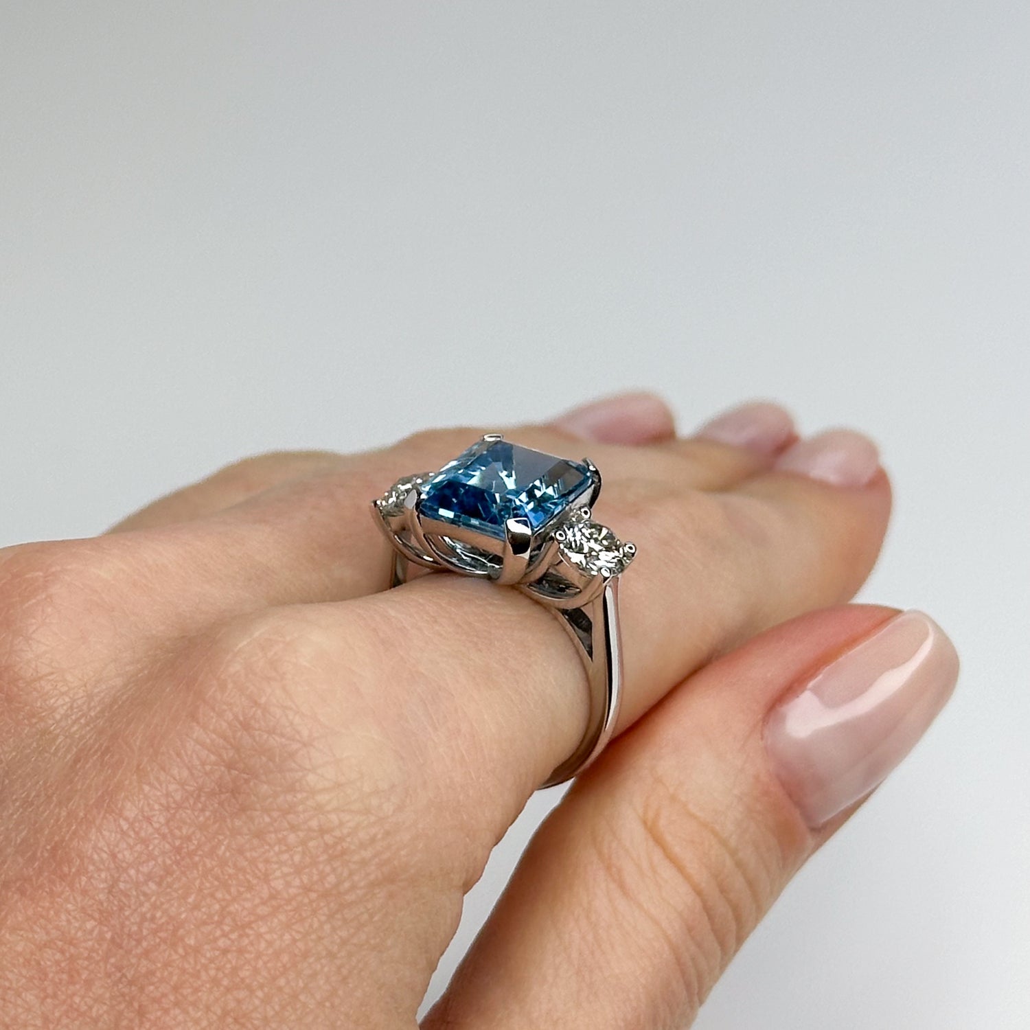 Blue Topaz Trilogy Ring with Diamonds