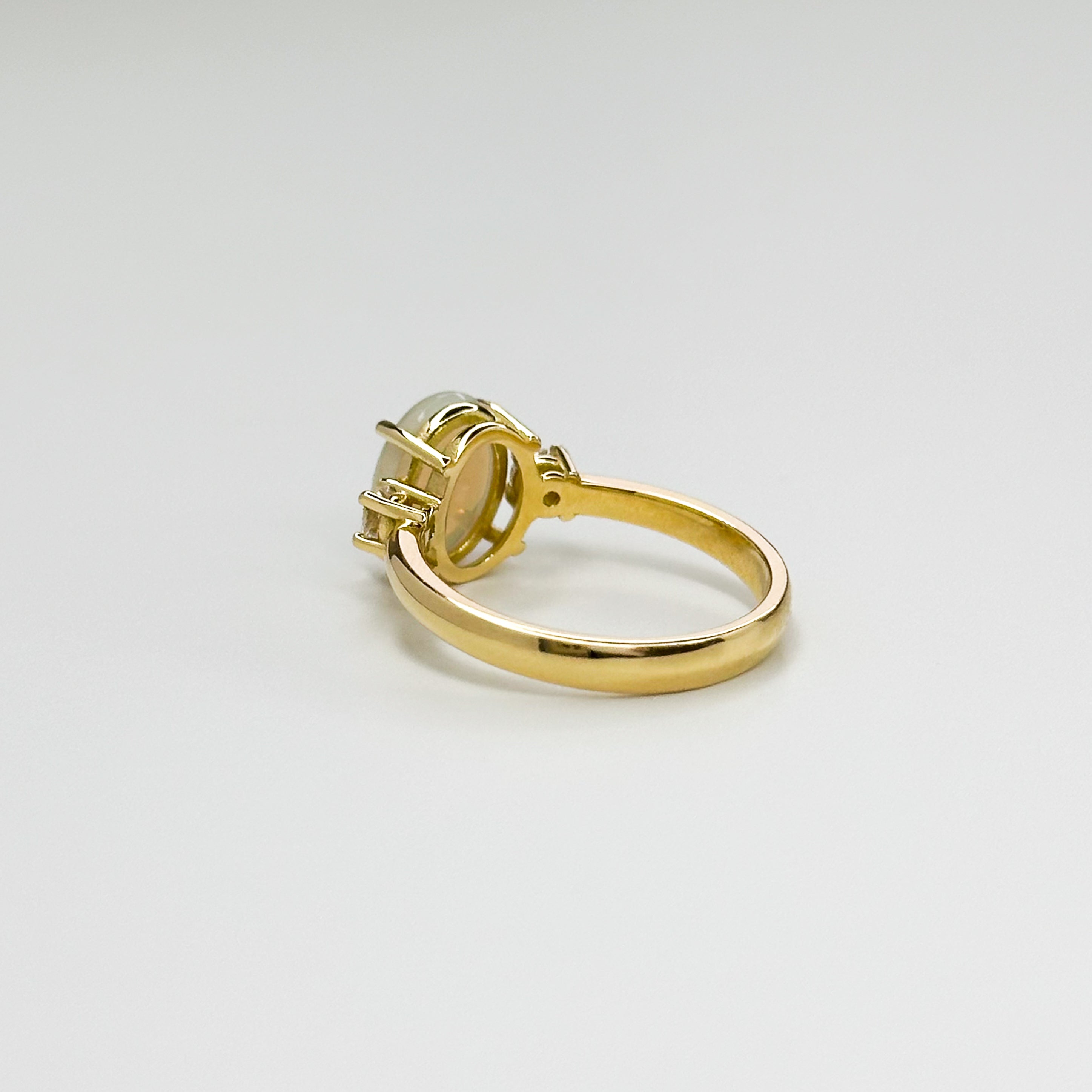 2.65ct Oval Opal and Diamond Trilogy Ring