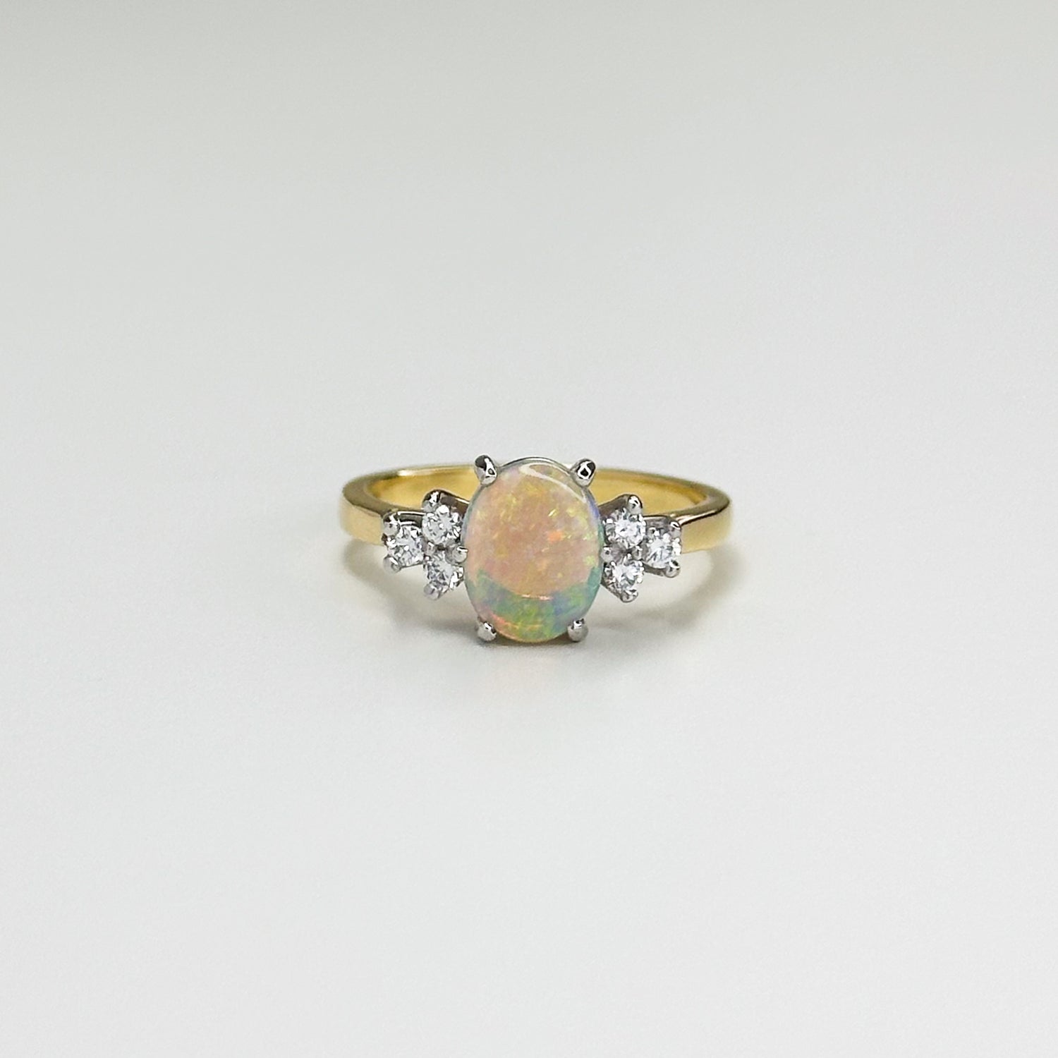 1.10ct Oval Opal and Diamond Ring