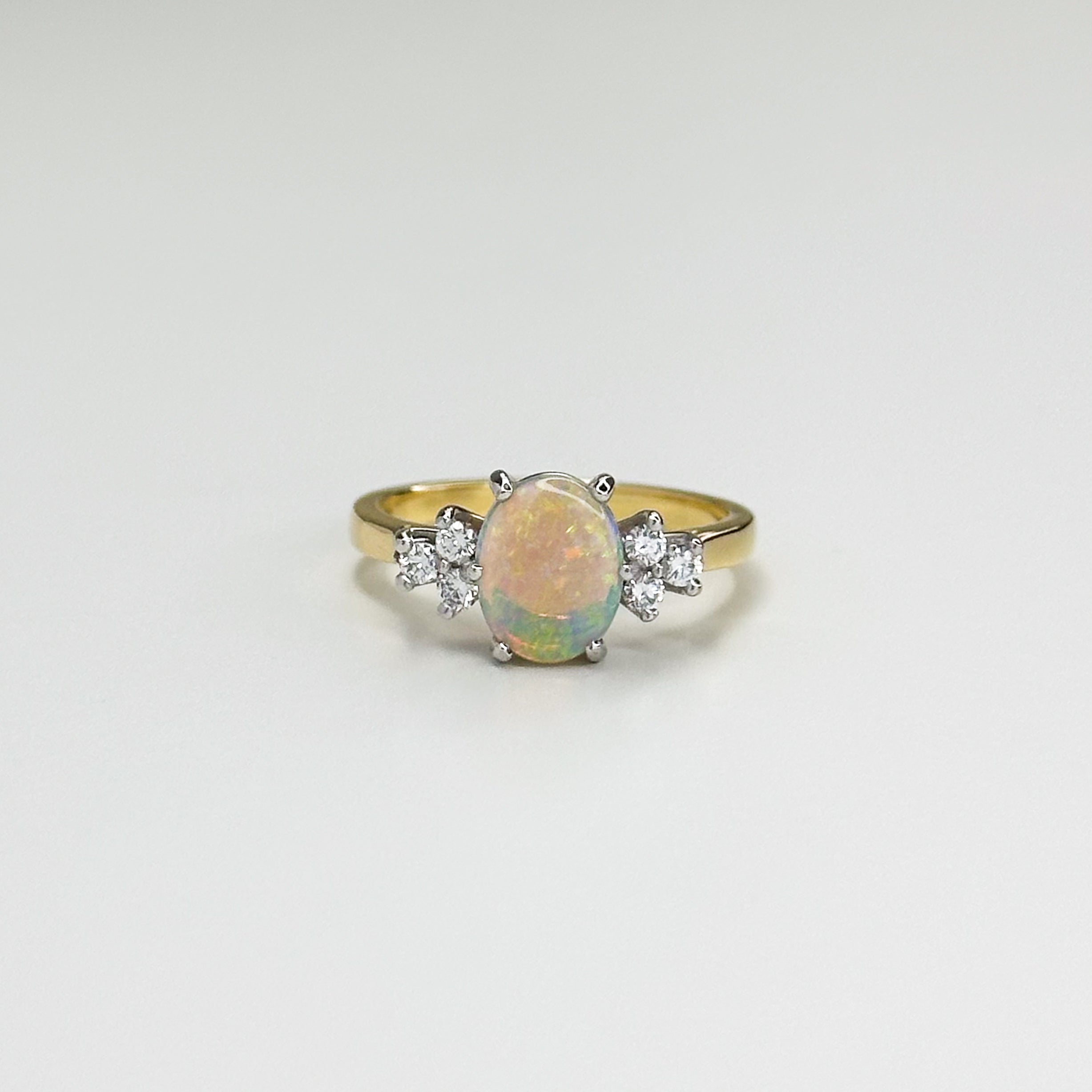1.10ct Oval Opal and Diamond Ring