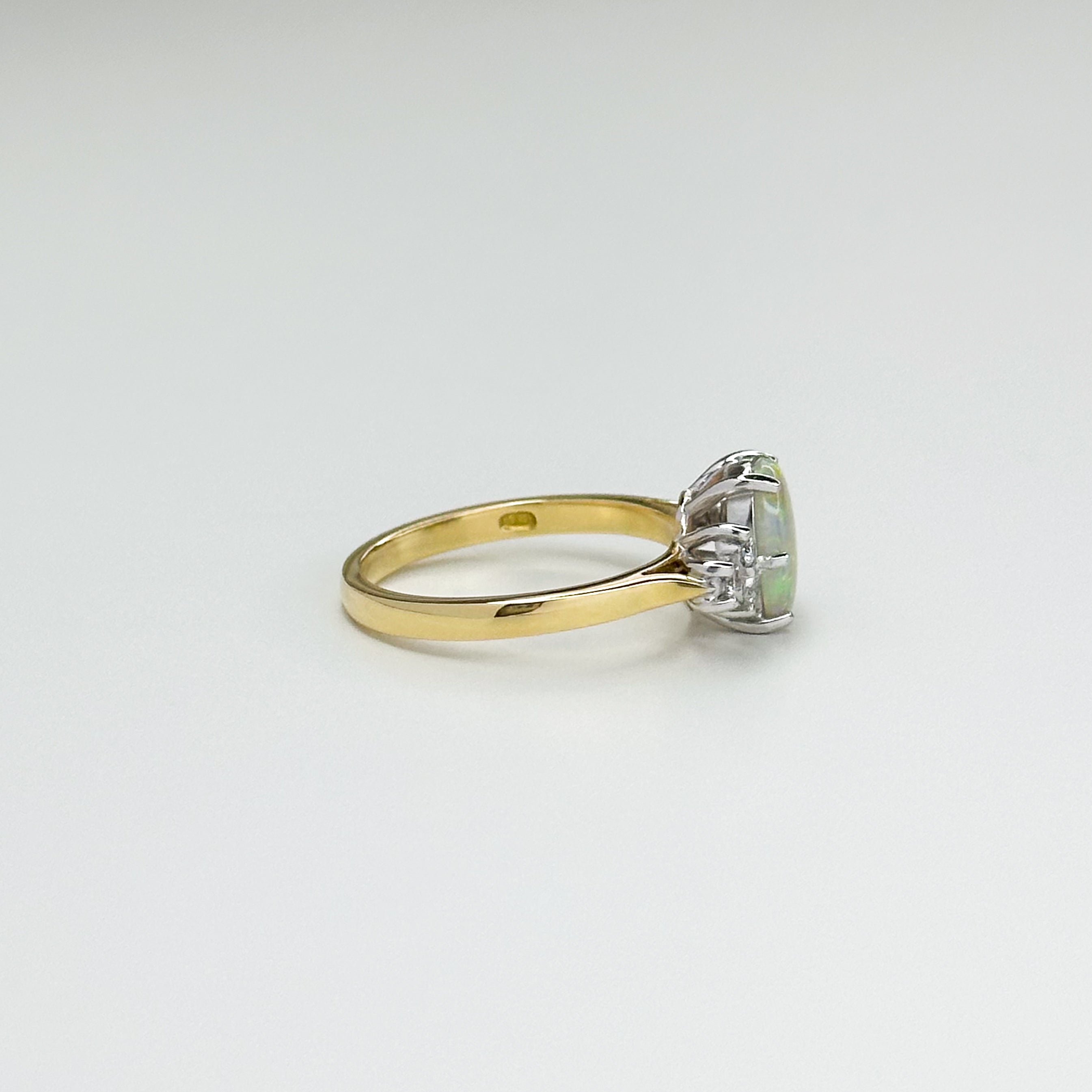 1.10ct Oval Opal and Diamond Ring