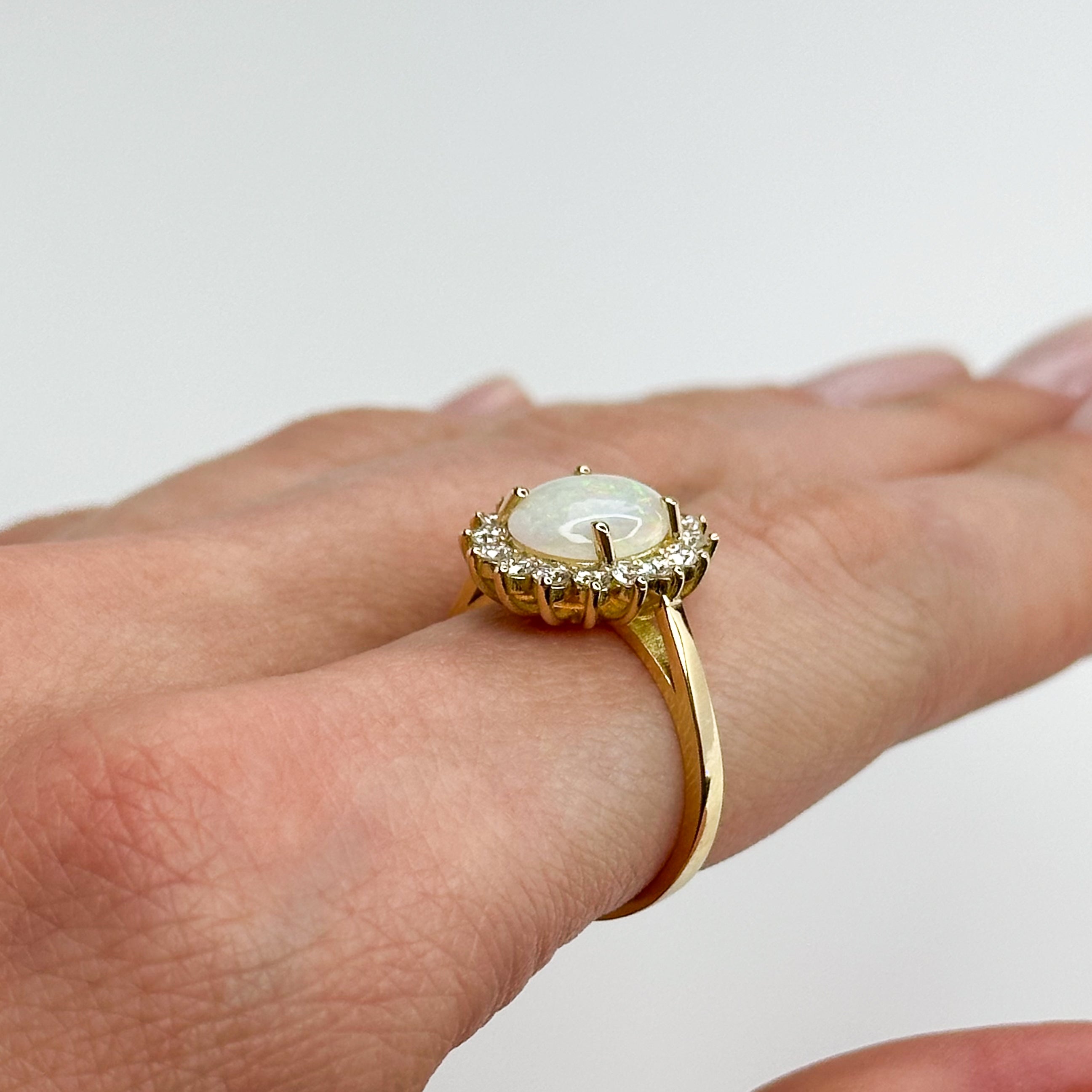 2.50ct Oval Opal Ring with Diamond Halo