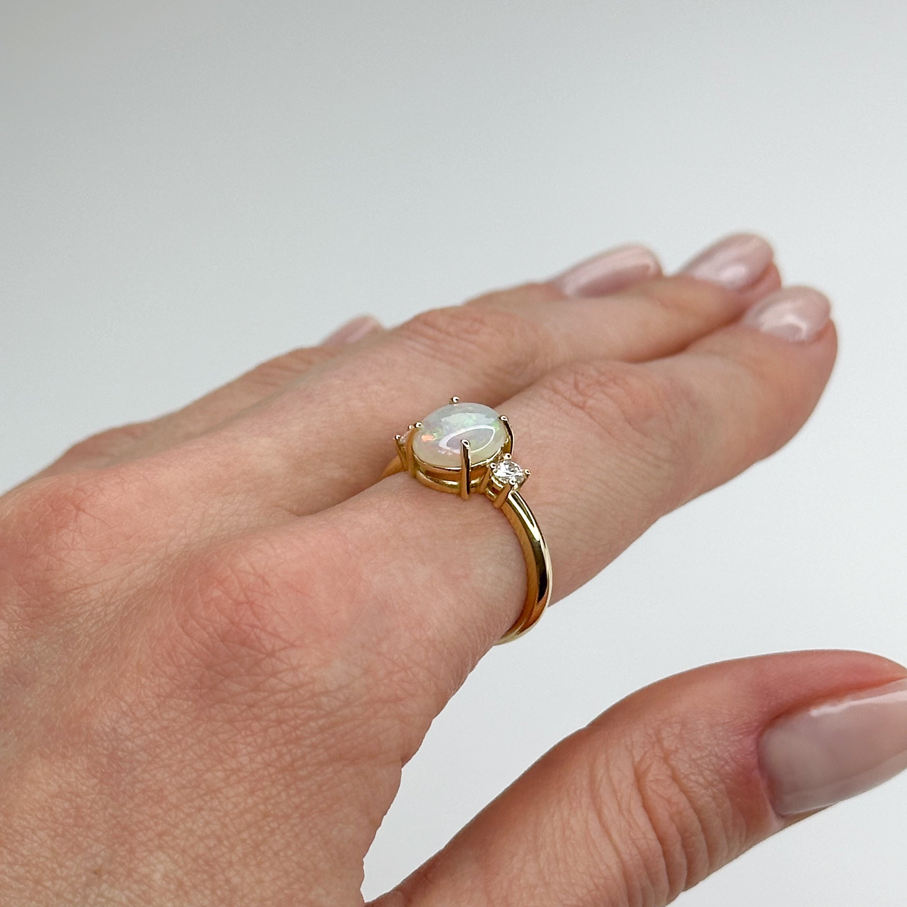 2.65ct Oval Opal and Diamond Trilogy Ring