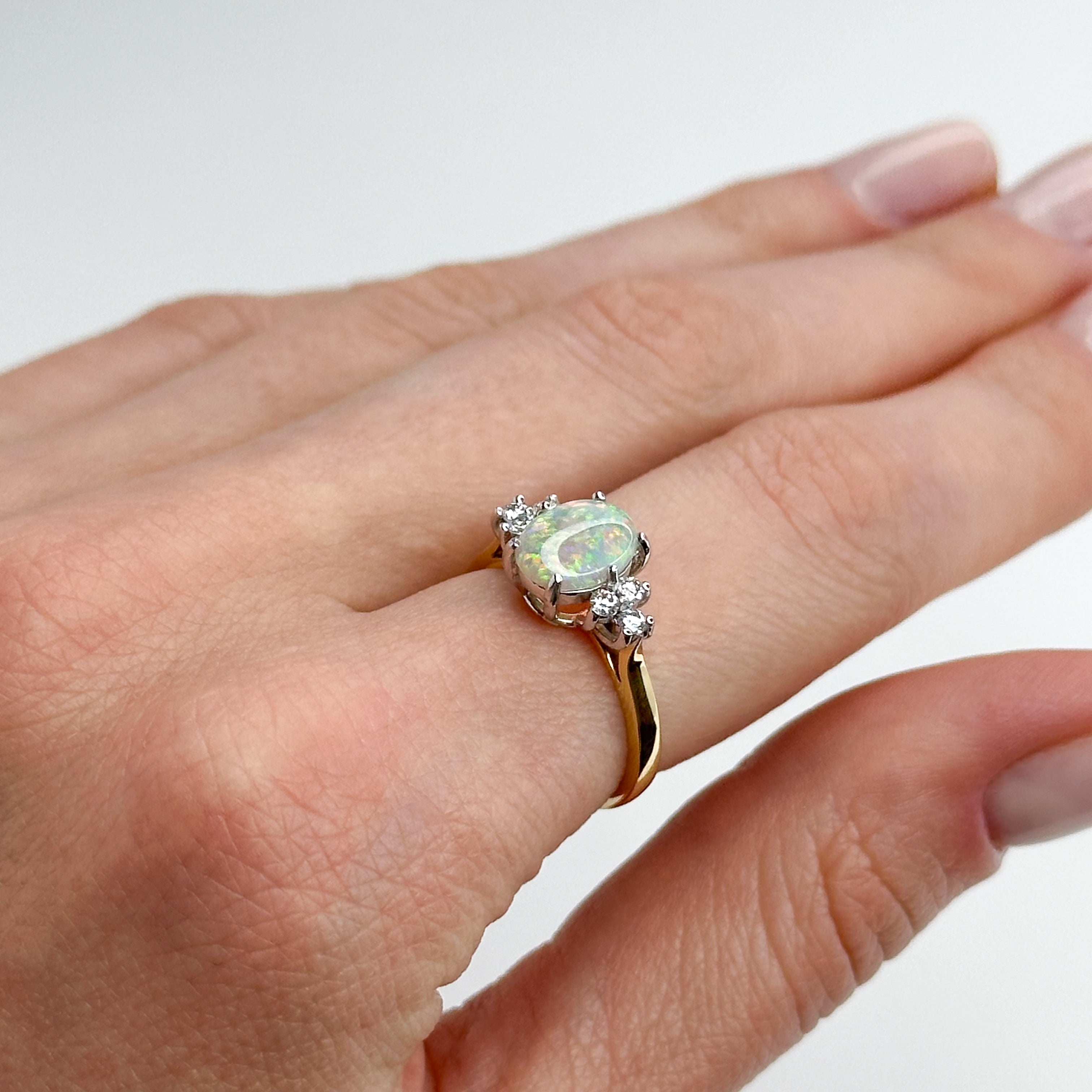 1.10ct Oval Opal and Diamond Ring