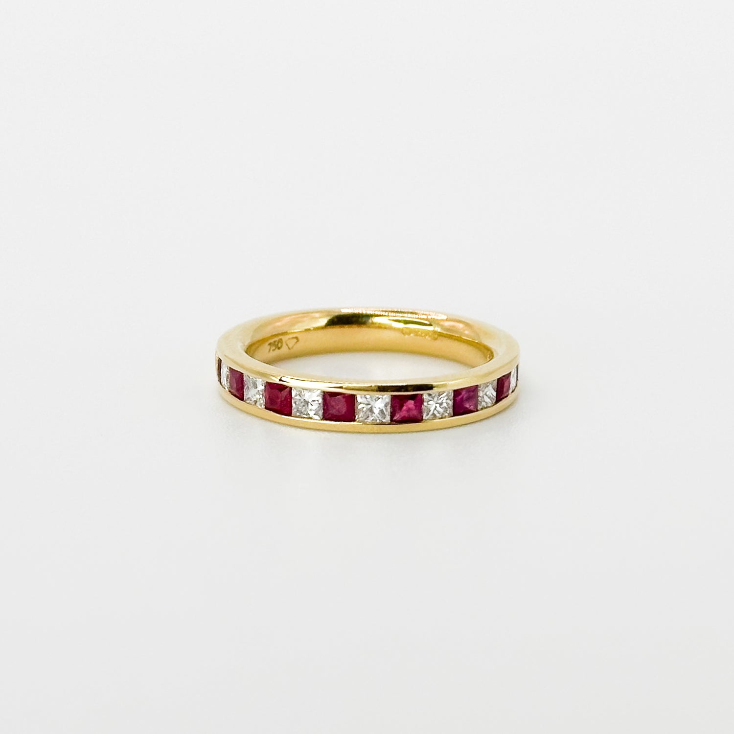 Ruby and Diamond Eternity Ring in Yellow Gold