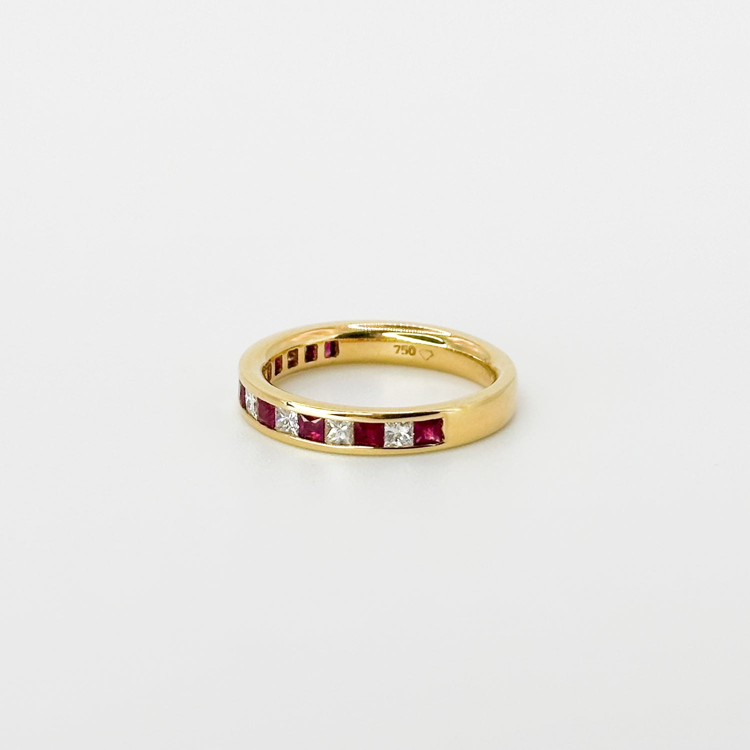 Ruby and Diamond Eternity Ring in Yellow Gold