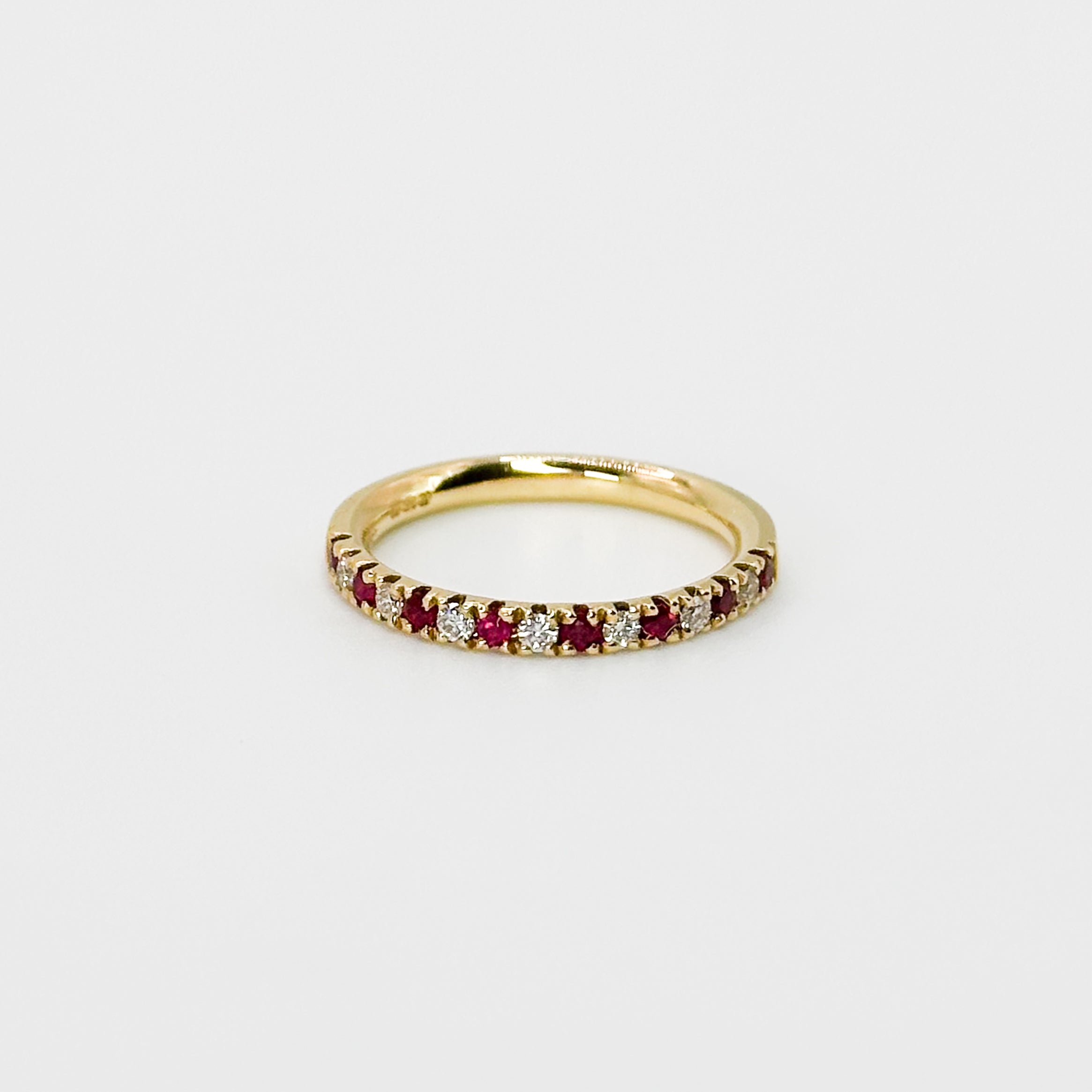 Ruby and Diamond Eternity Ring in Yellow Gold