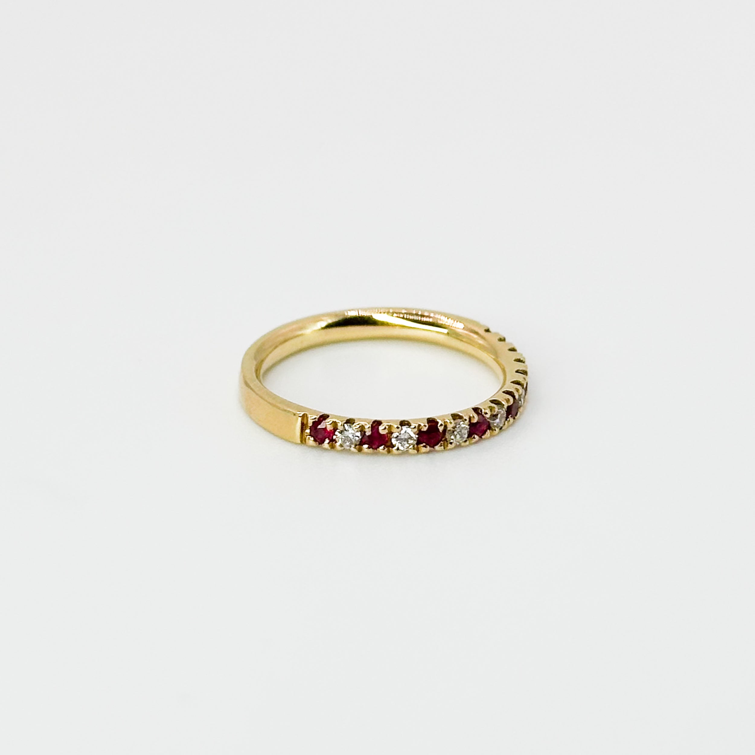 Ruby and Diamond Eternity Ring in Yellow Gold