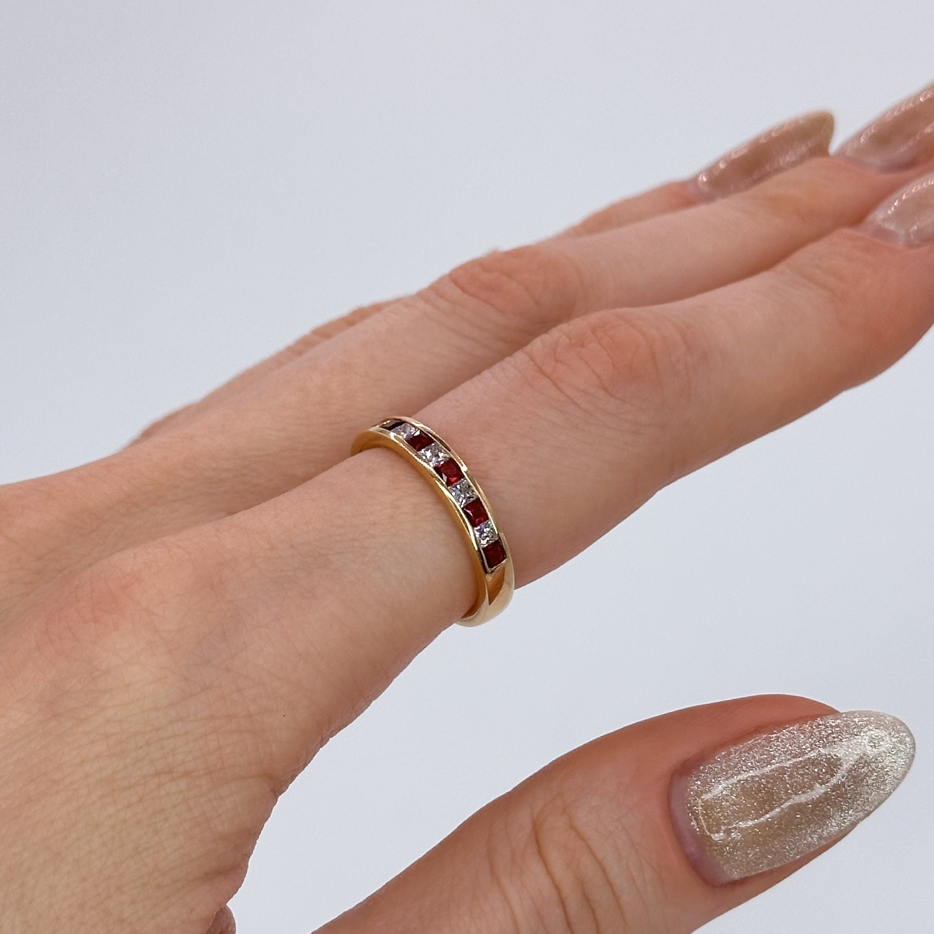 Ruby and Diamond Eternity Ring in Yellow Gold