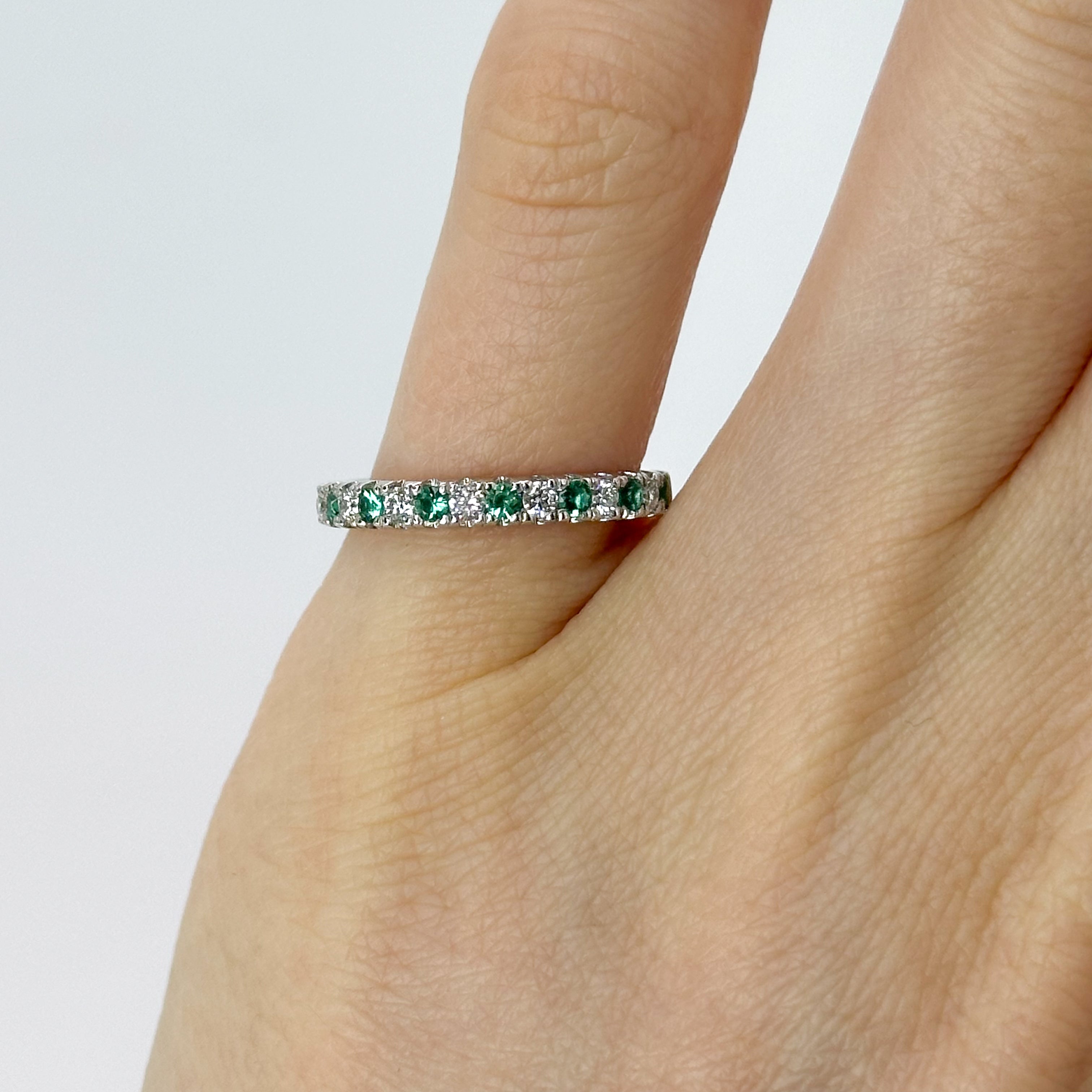 Diamond and Emerald Eternity Ring in Platinum