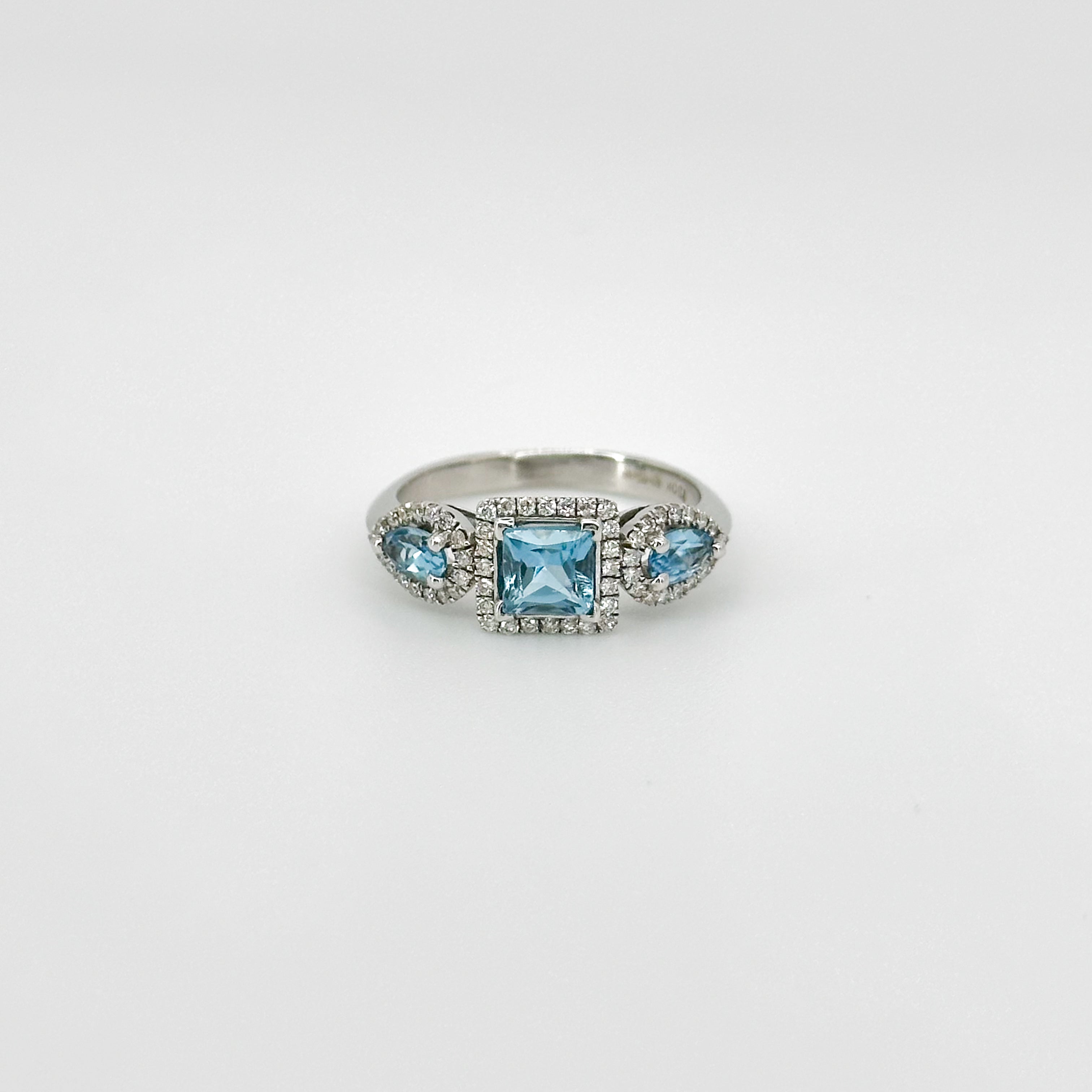 Blue Topaz Trilogy with Diamond Halo