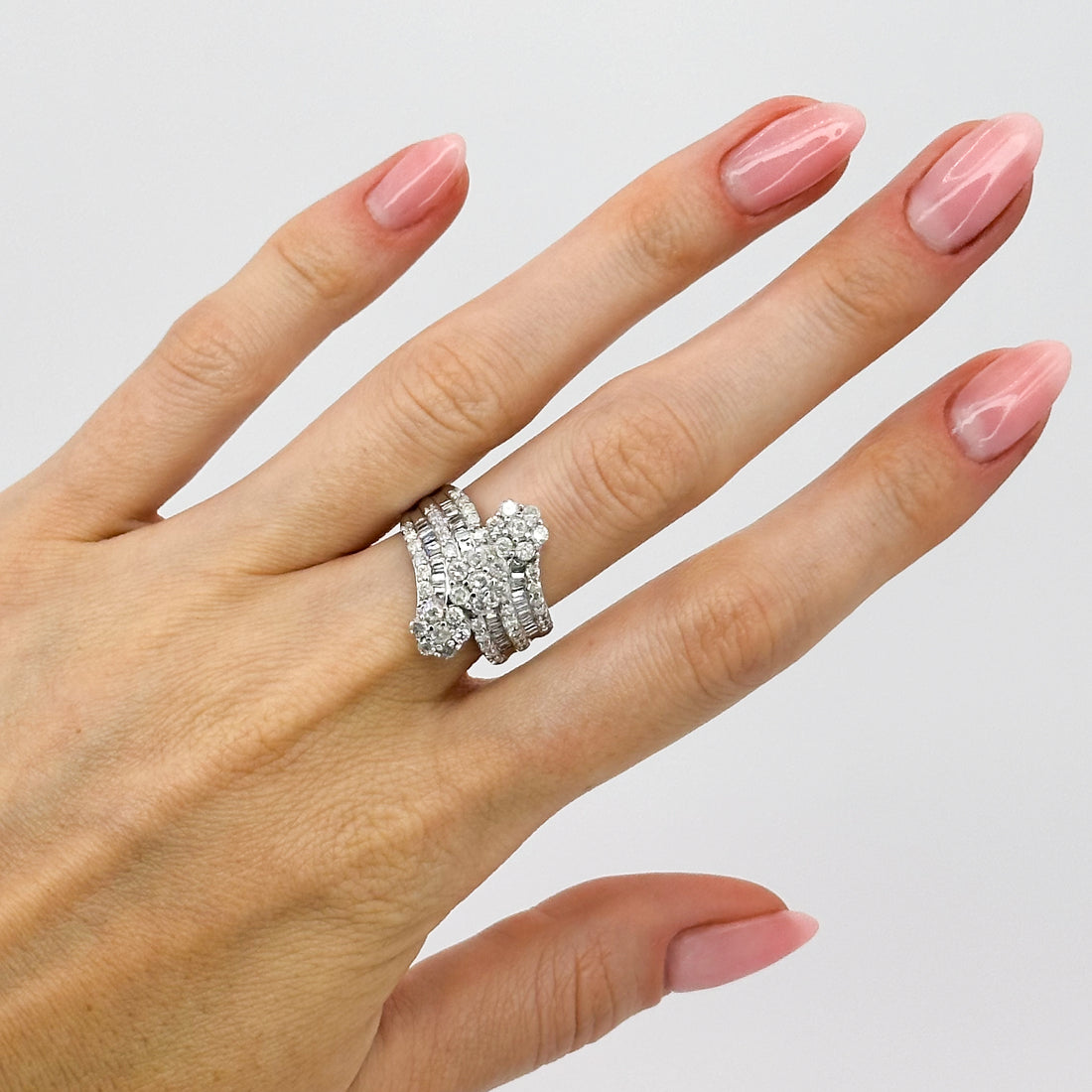 Three Daisy Clusters Diamond ring