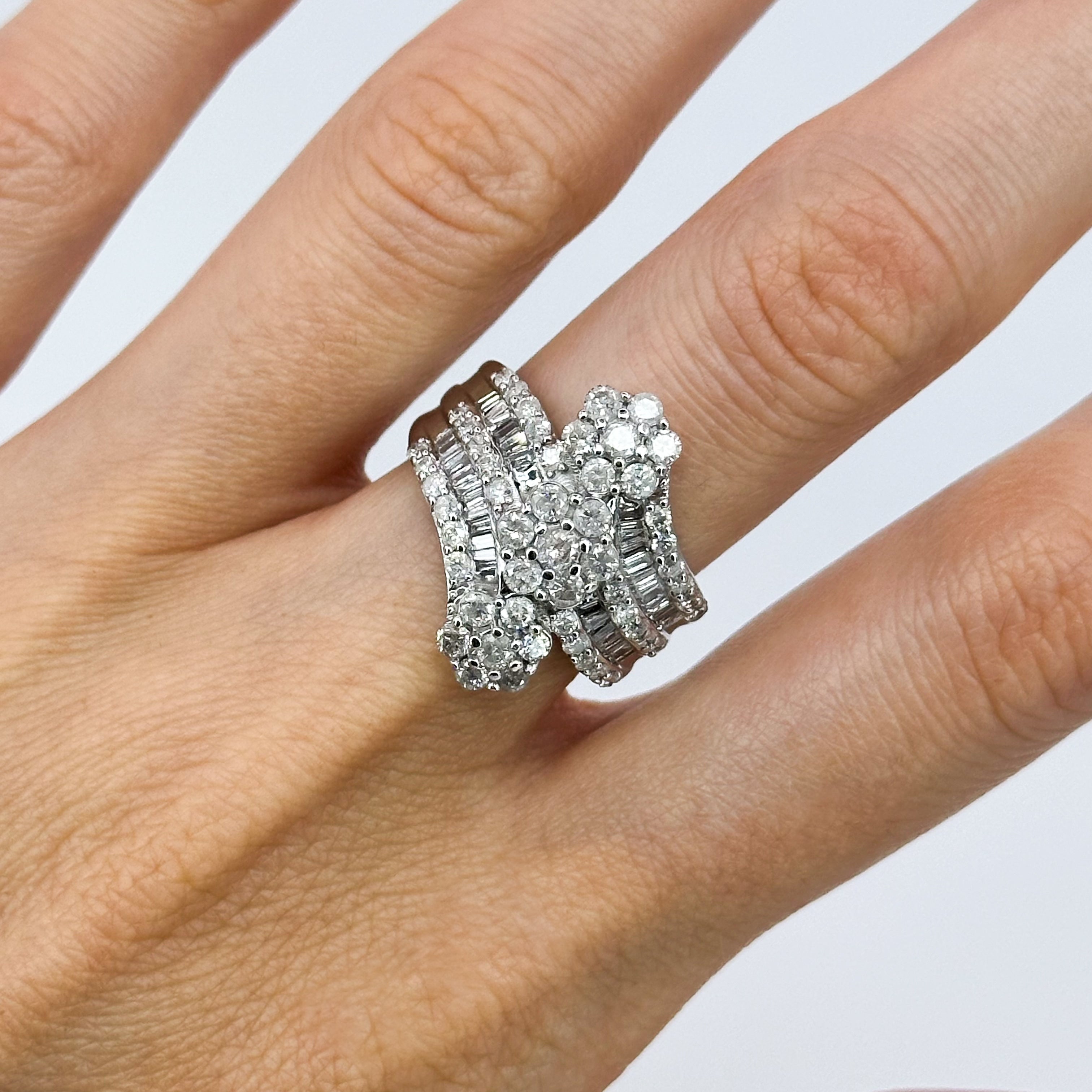 Three Daisy Clusters Diamond ring