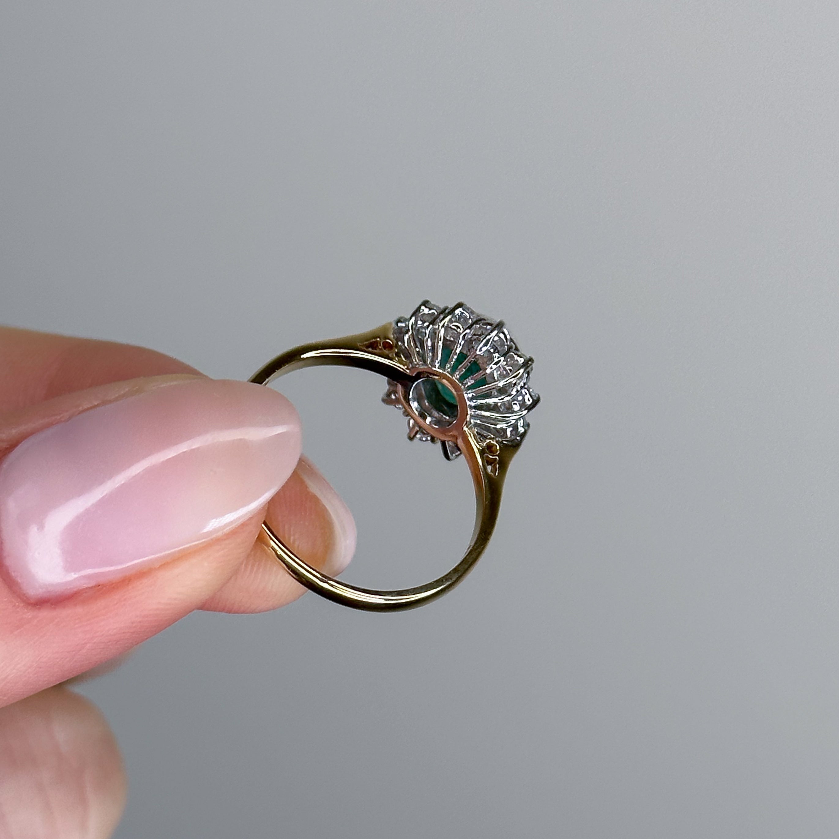 1.60ct Emerald Ring with 0.50ct Diamond Halo