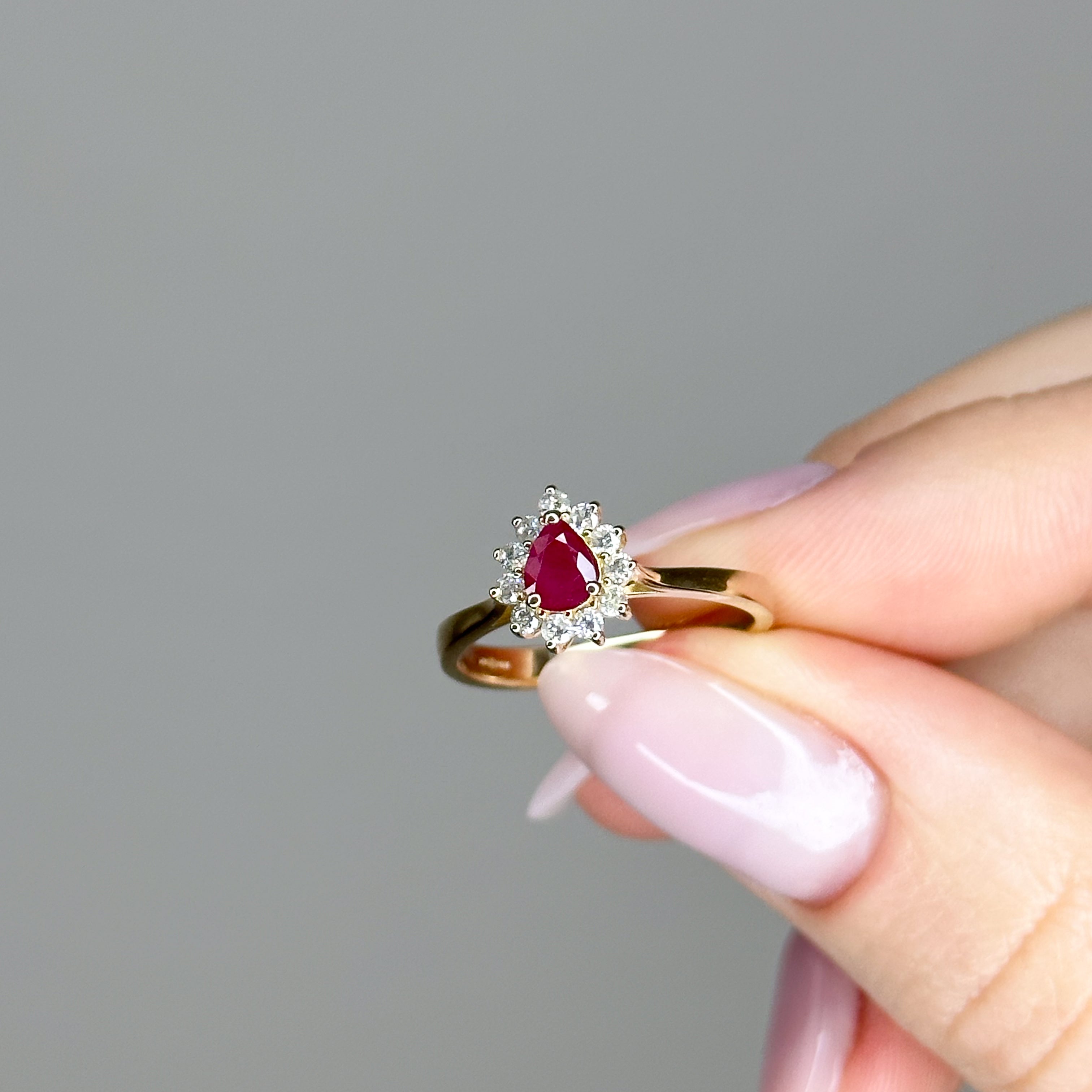 0.35ct Pear Shape Pink Ruby Ring with Halo