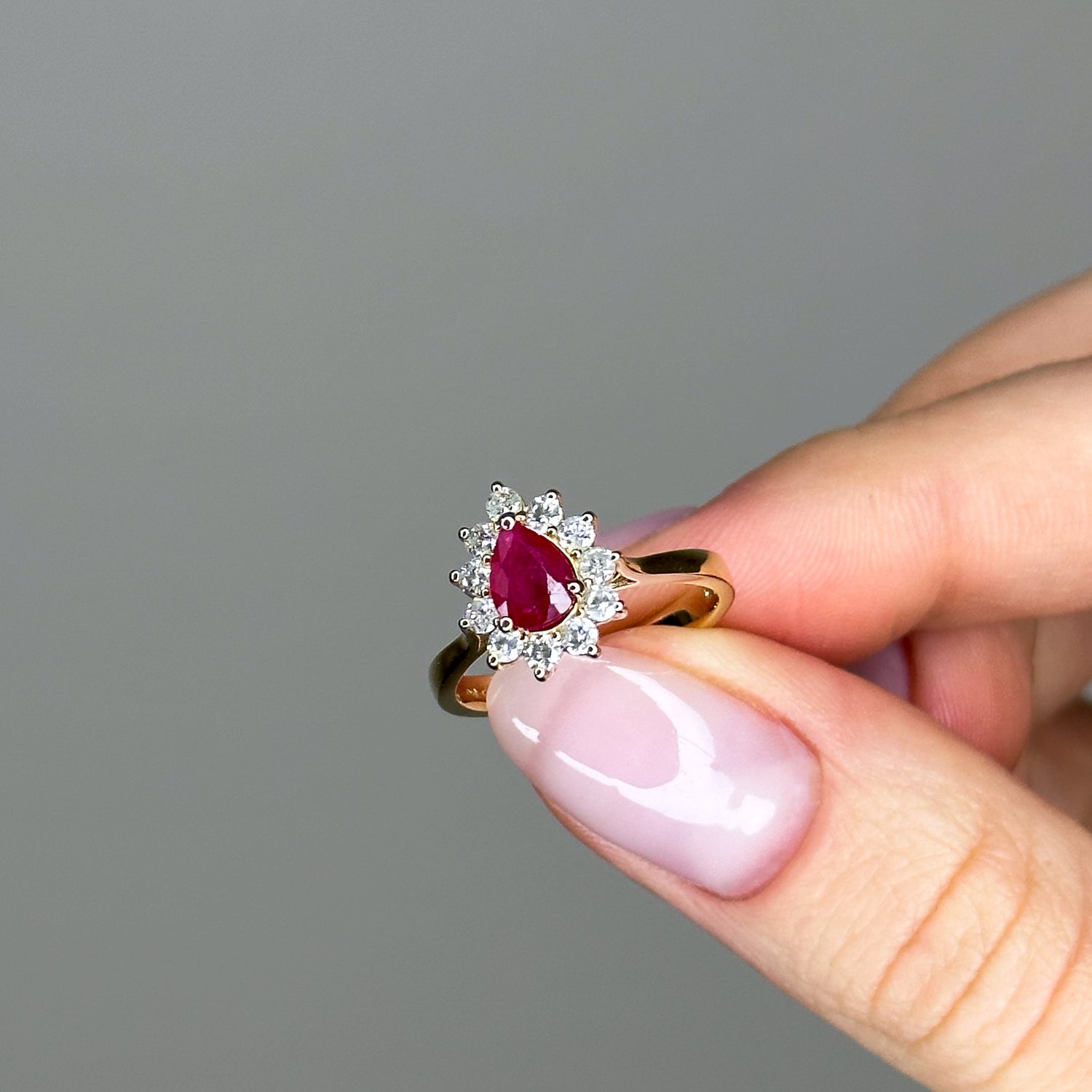 0.80ct Pear Shape Pink Ruby Ring with Diamond Halo