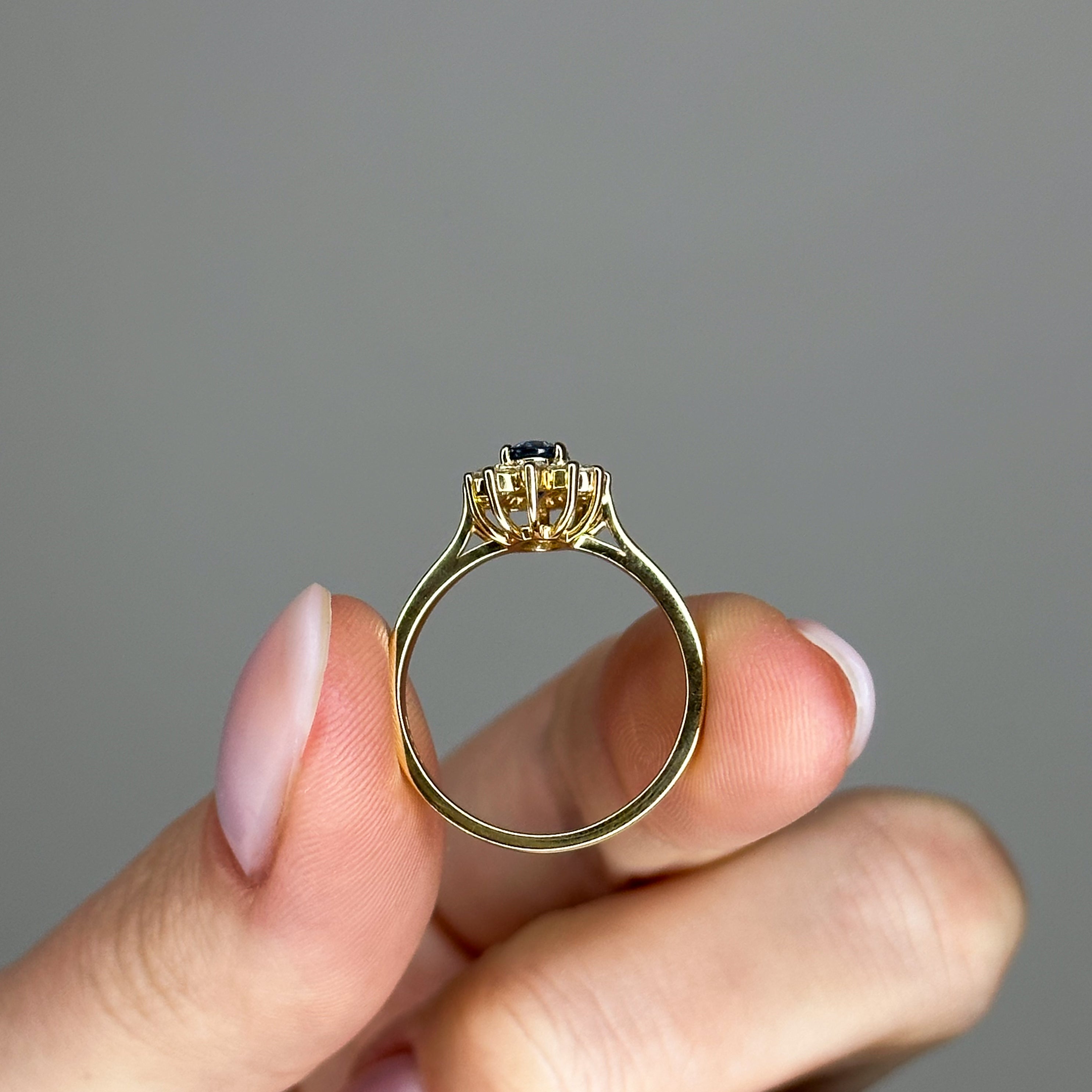 Oval Sapphire Ring with Diamond Halo