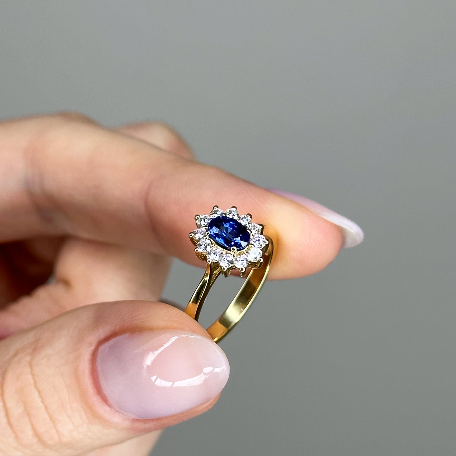 Oval Sapphire Ring with Diamond Halo