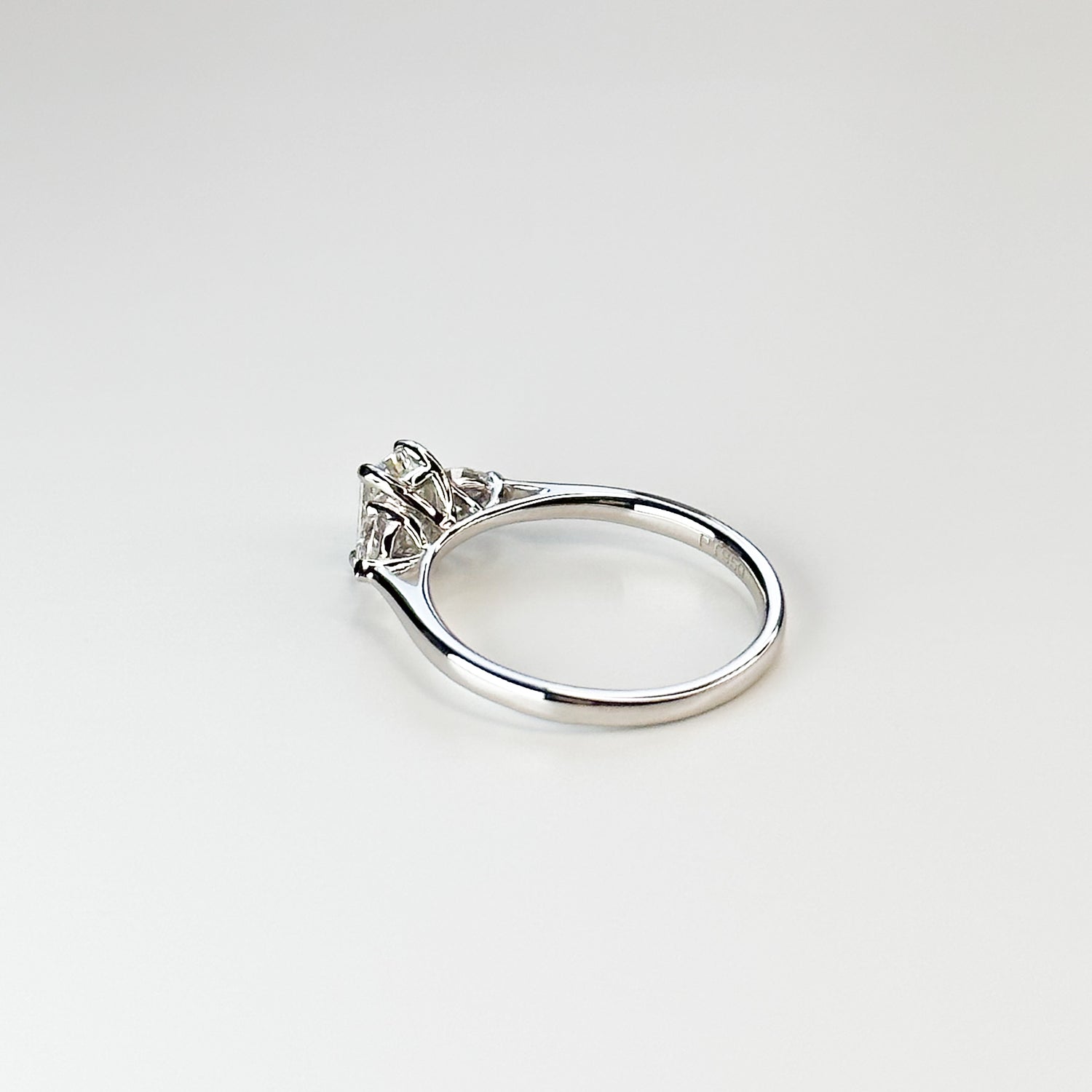 0.57ct GIA certified Emerald Cut Diamond Trilogy Ring