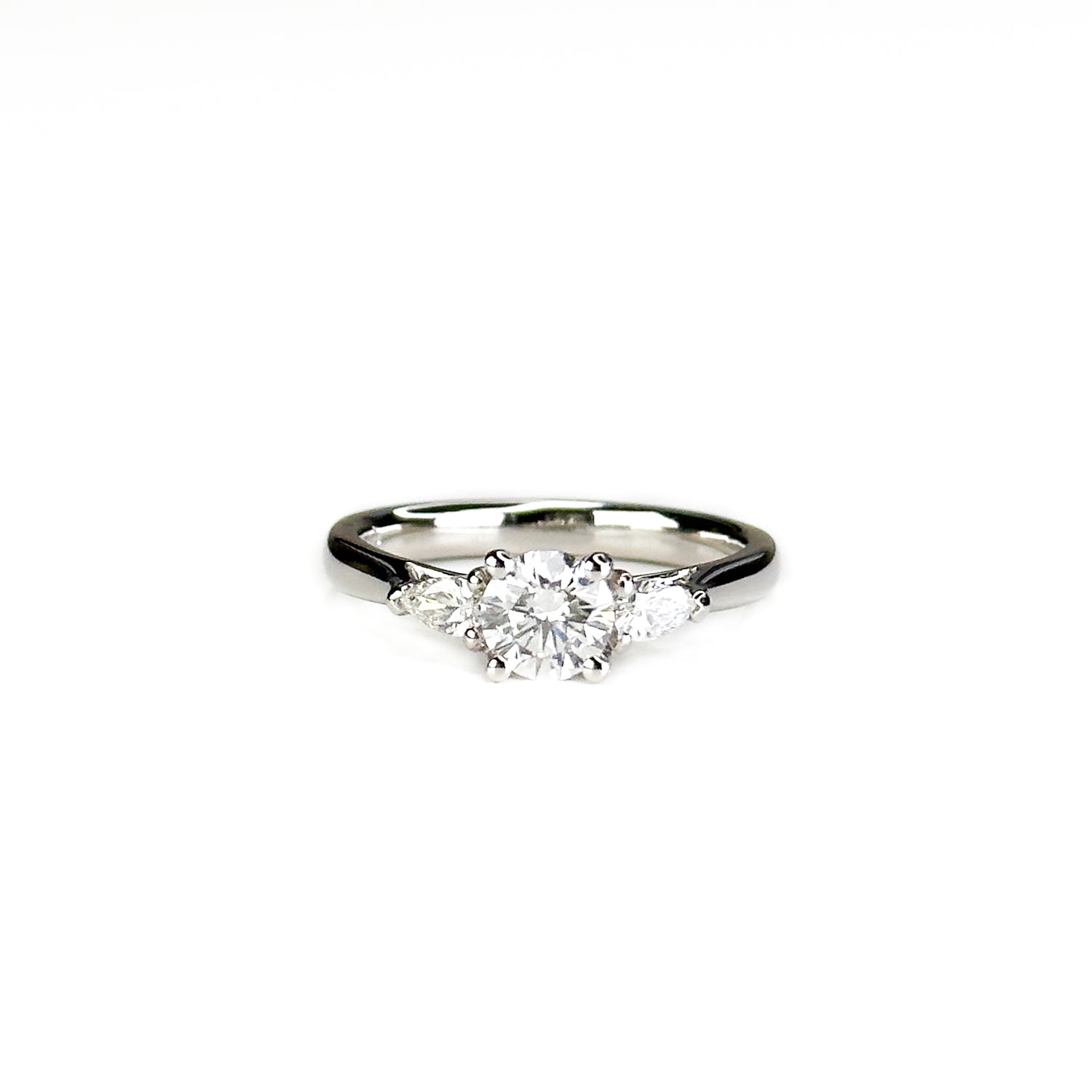 Diamond Trilogy Ring with 0.58ct Round Centre Stone