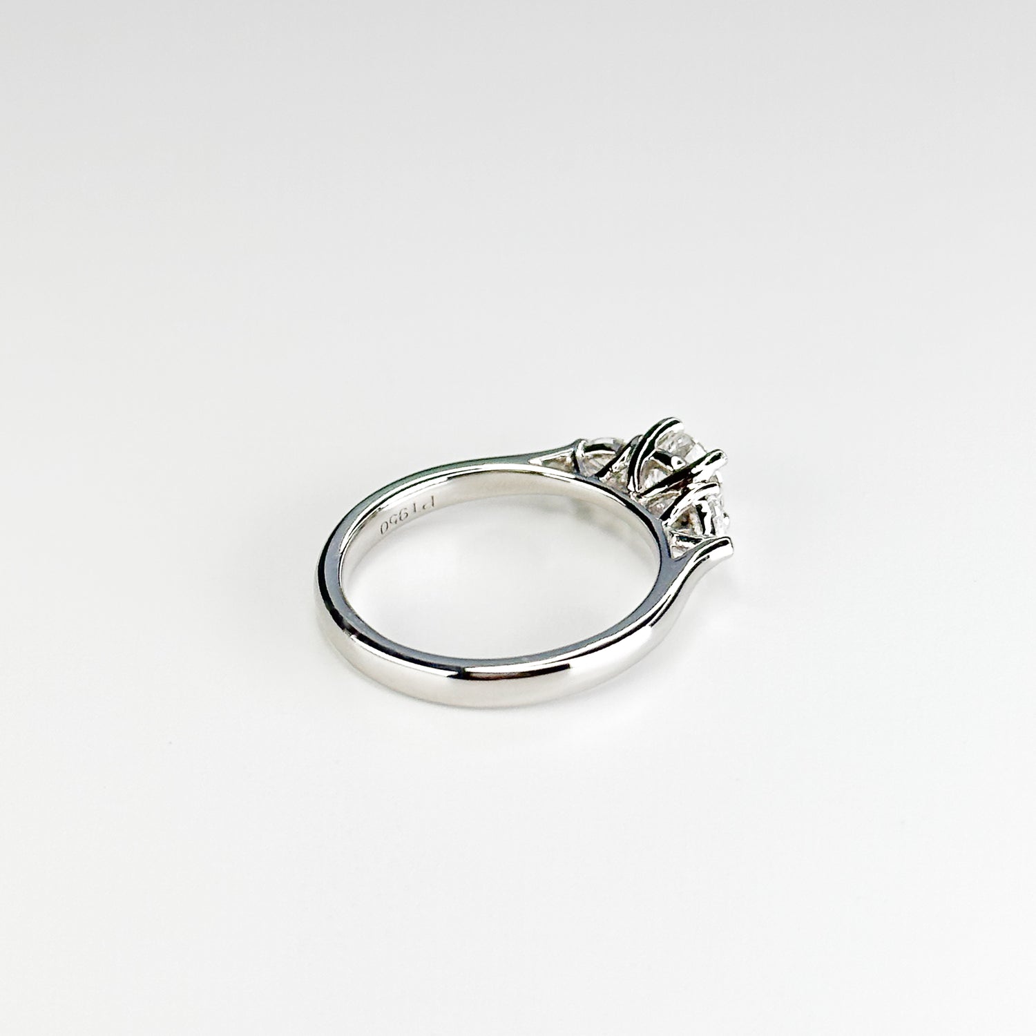 Diamond Trilogy Ring with 0.58ct Round Centre Stone