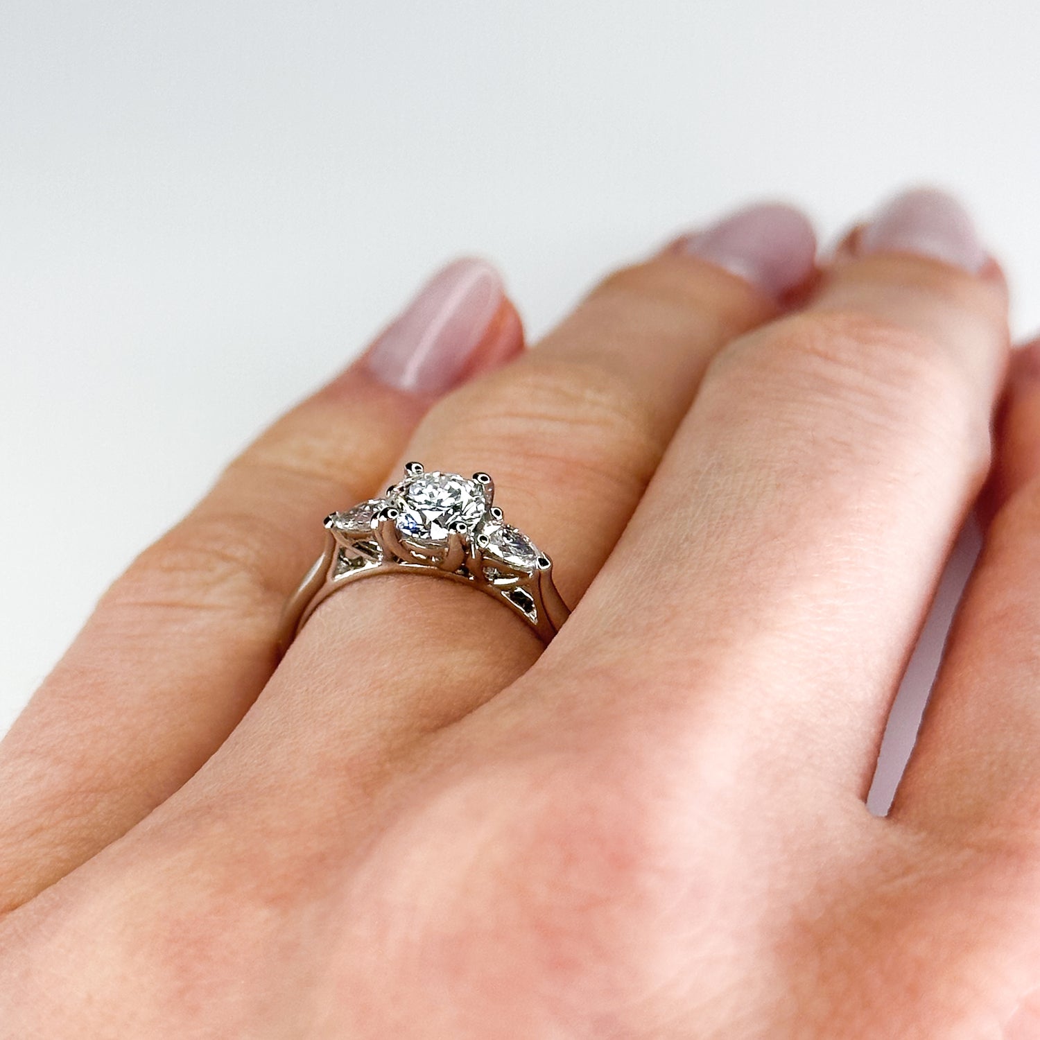 Diamond Trilogy Ring with 0.58ct Round Centre Stone