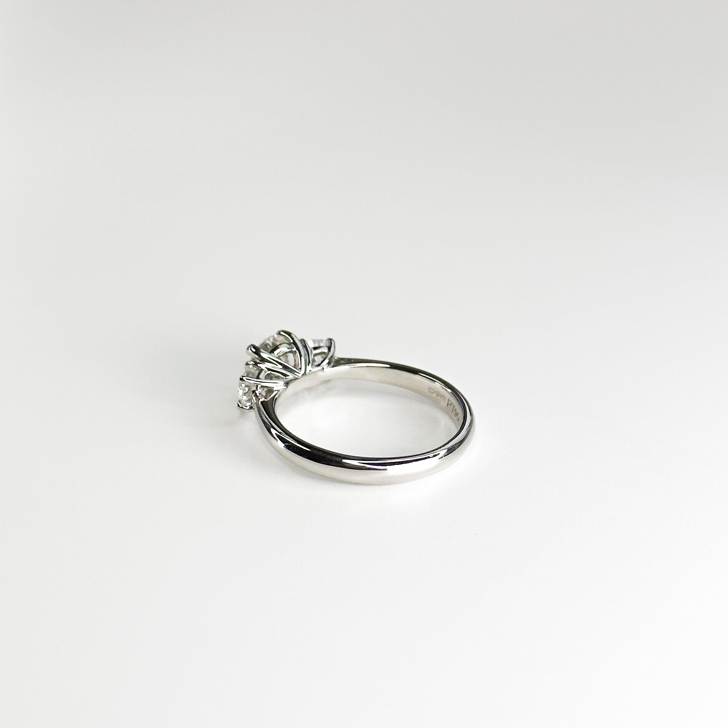 Diamond Trilogy Ring with 0.70ct Round Centre Stone