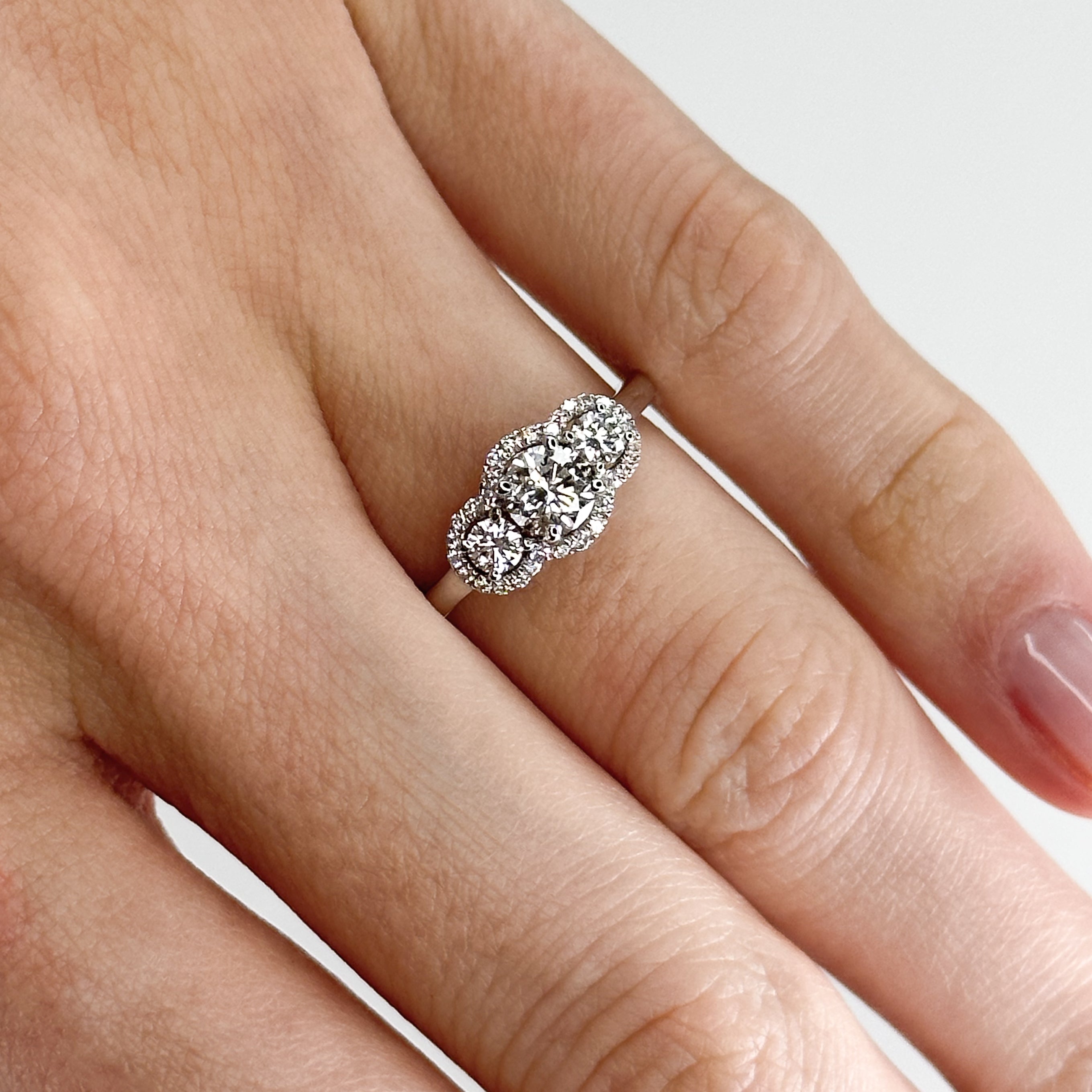 Diamond Trilogy Ring with 0.60ct Round Cut Stone