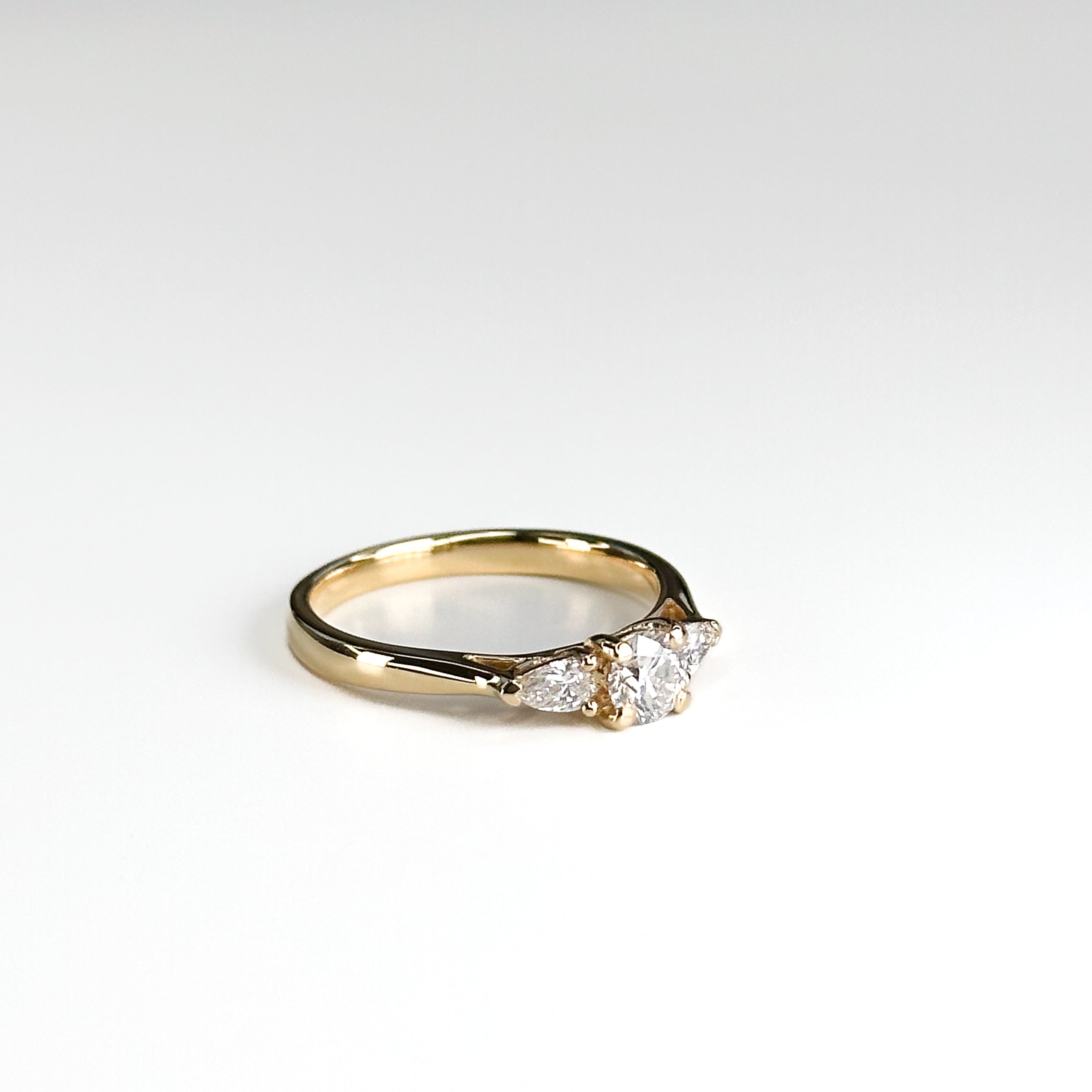 Diamond Trilogy ring with 0.34ct Round Cut Centre Diamond