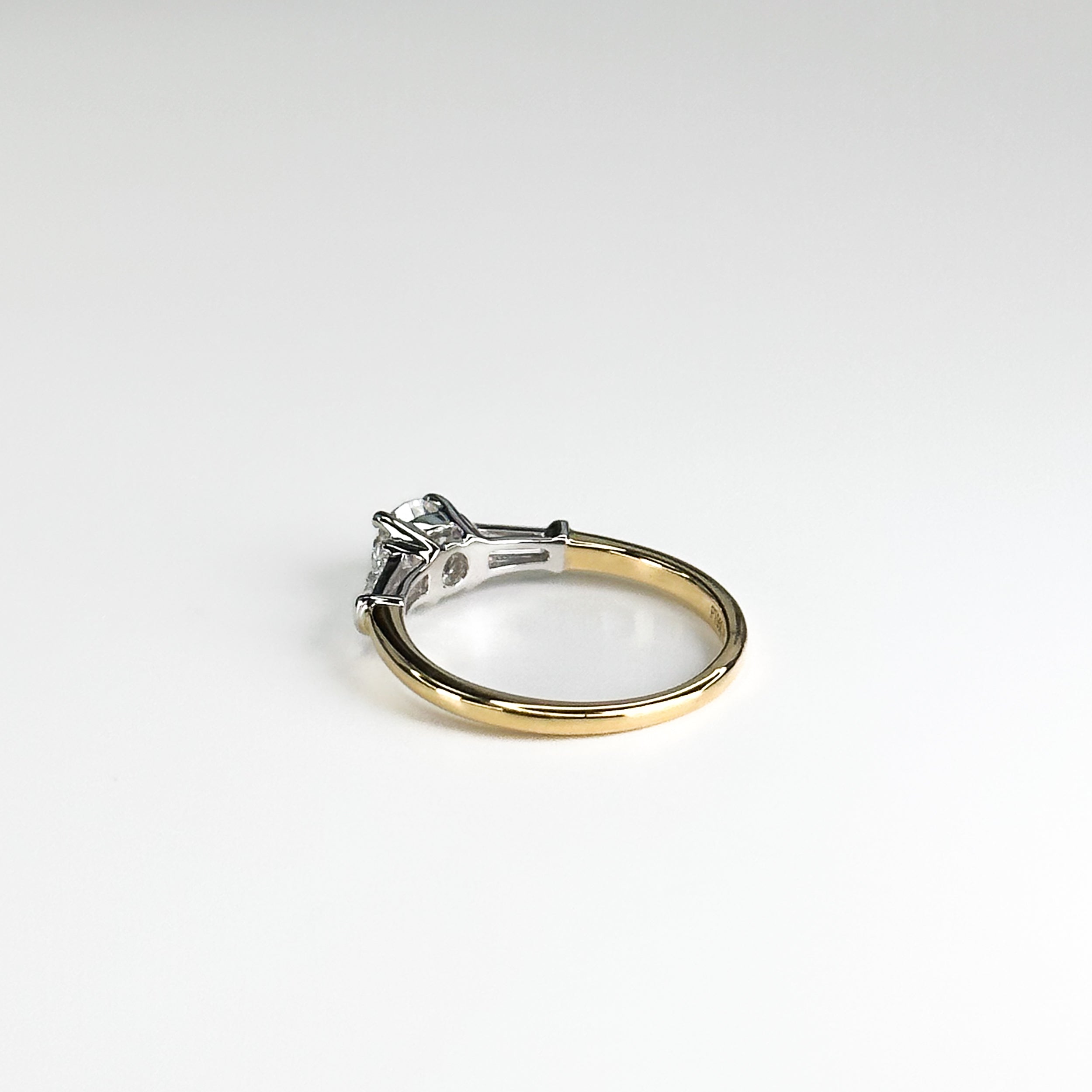 Diamond Trilogy Ring with 0.52ct Round Centre Stone