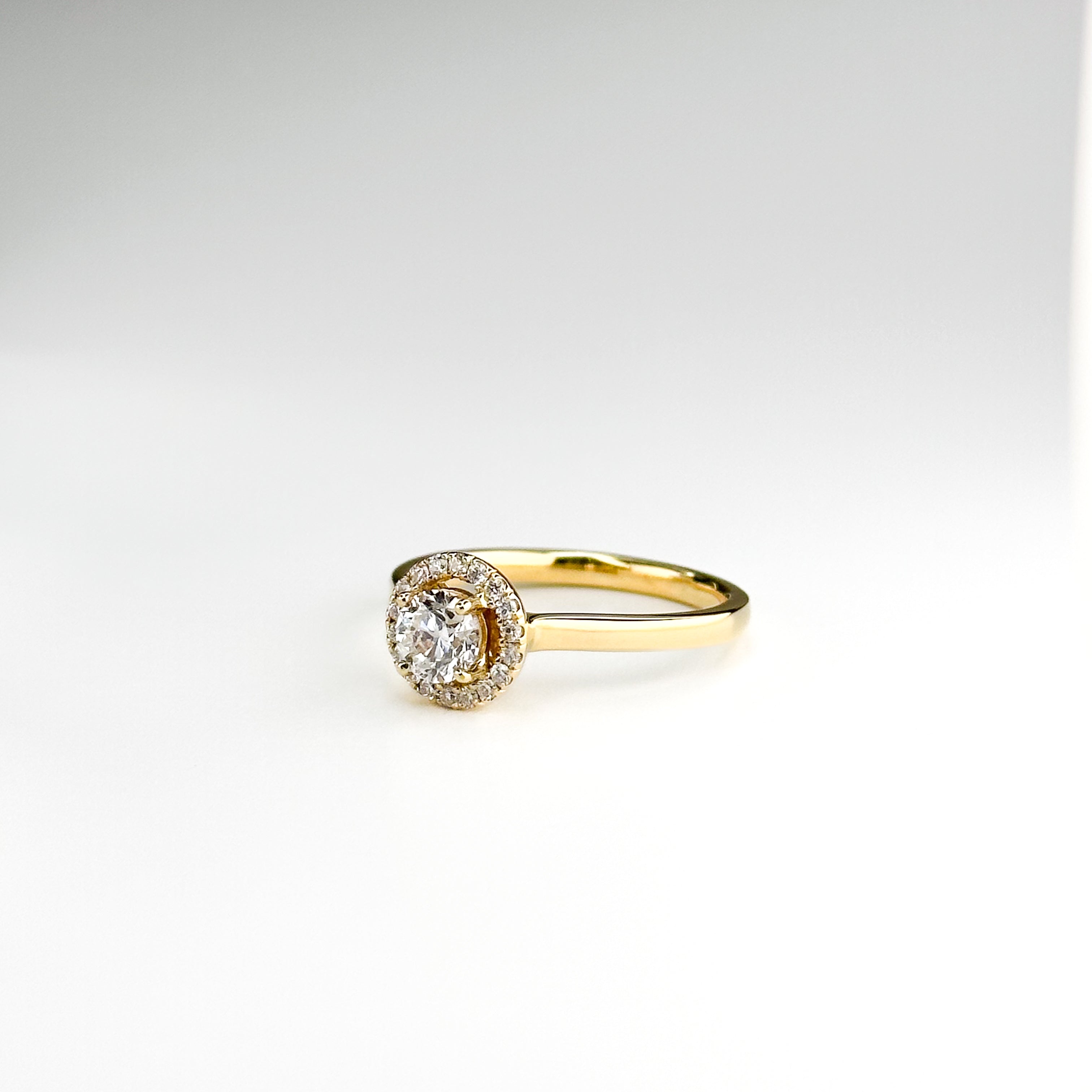 0.52ct Round Cut Diamond Ring in Yellow Gold