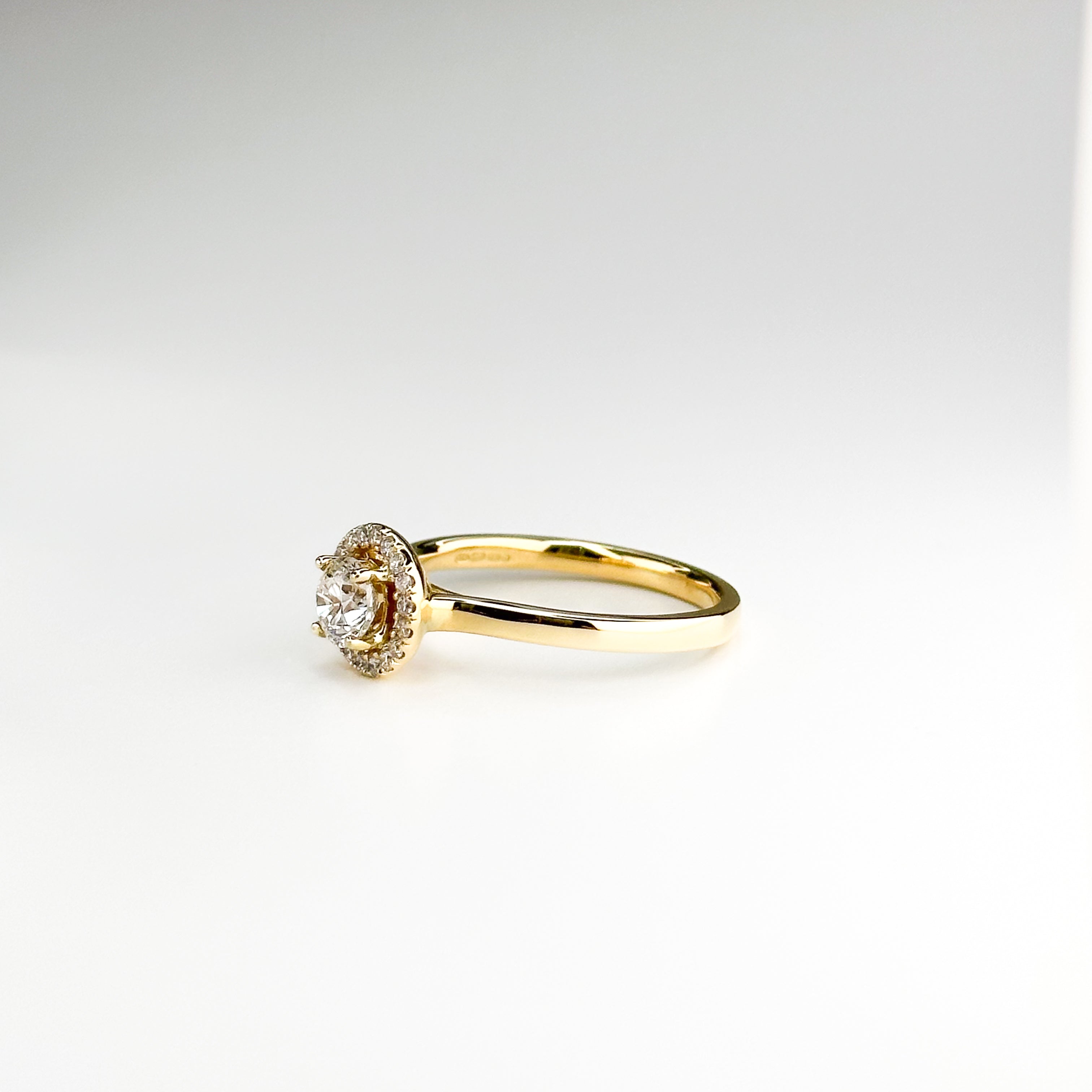 0.52ct Round Cut Diamond Ring in Yellow Gold