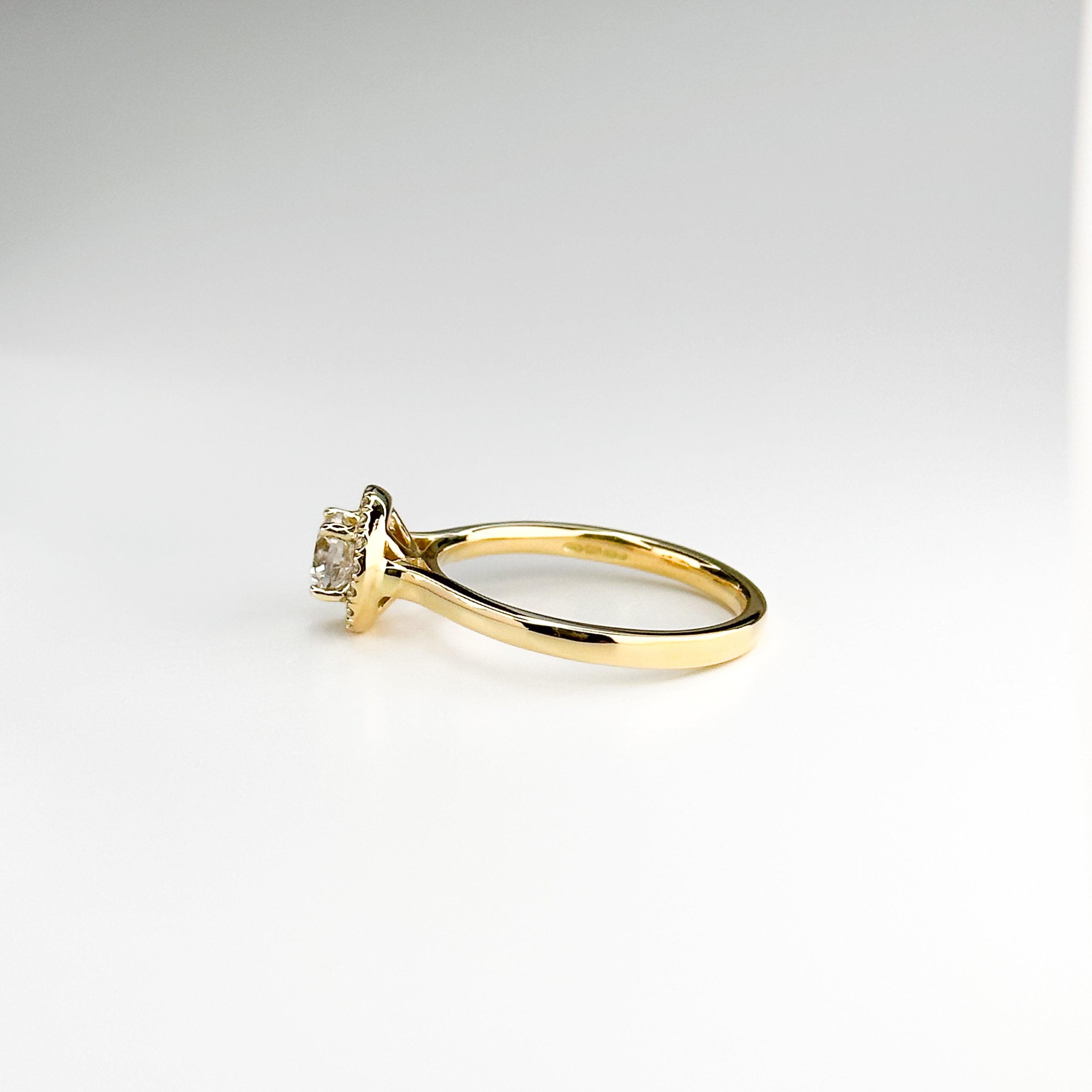 0.52ct Round Cut Diamond Ring in Yellow Gold